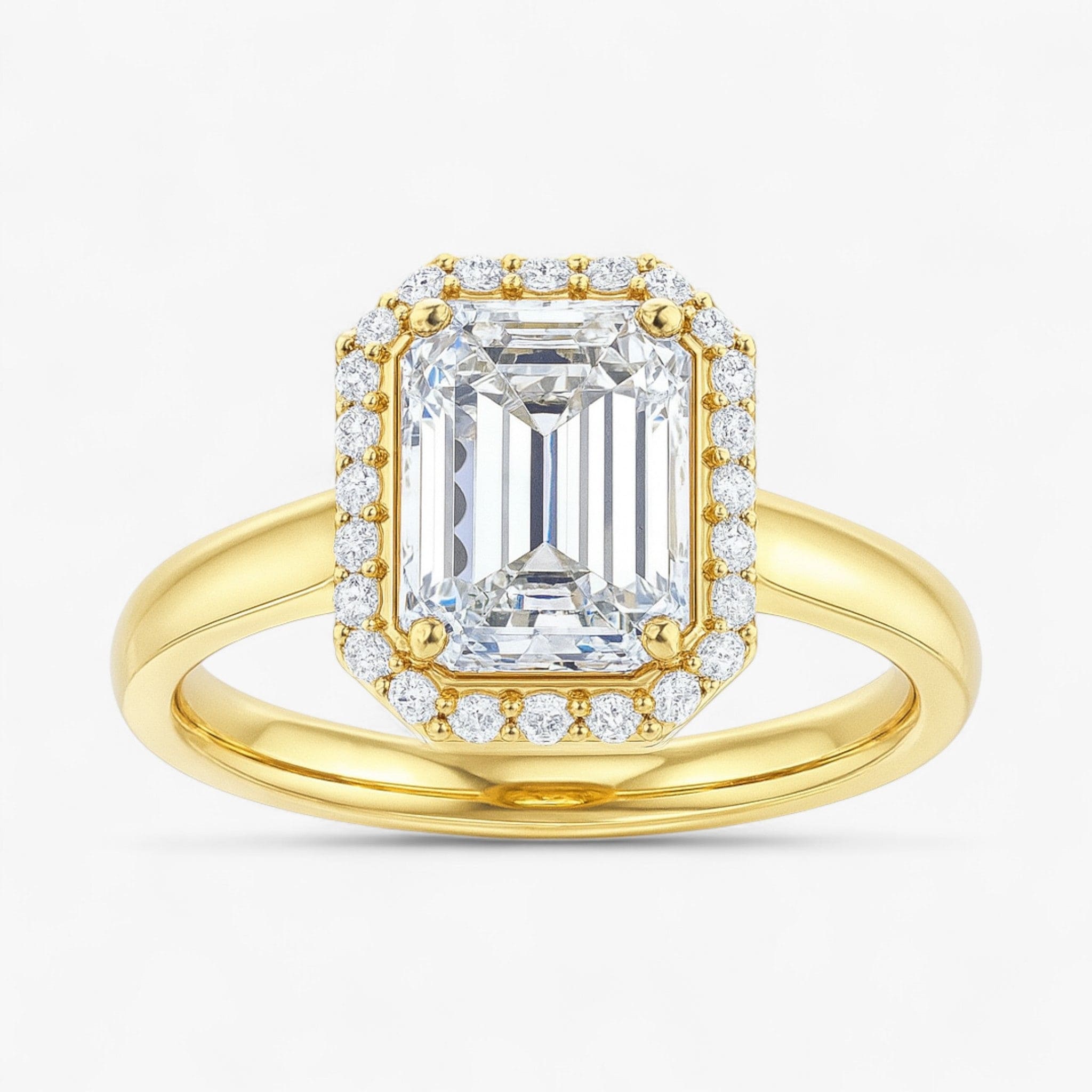 The Classic Halo Engagement Ring | Emerald