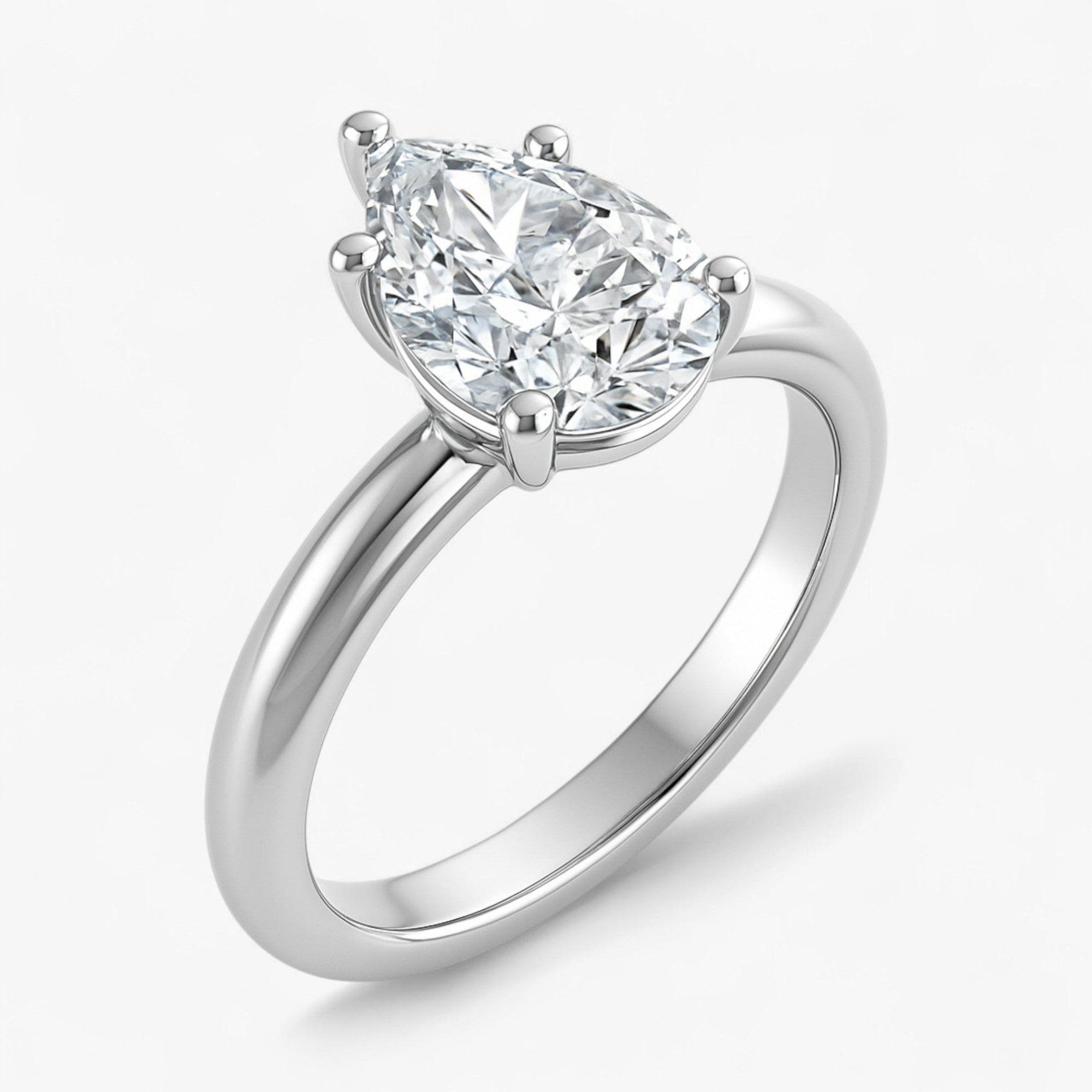 The Signature Solitaire Engagement Ring | Pear