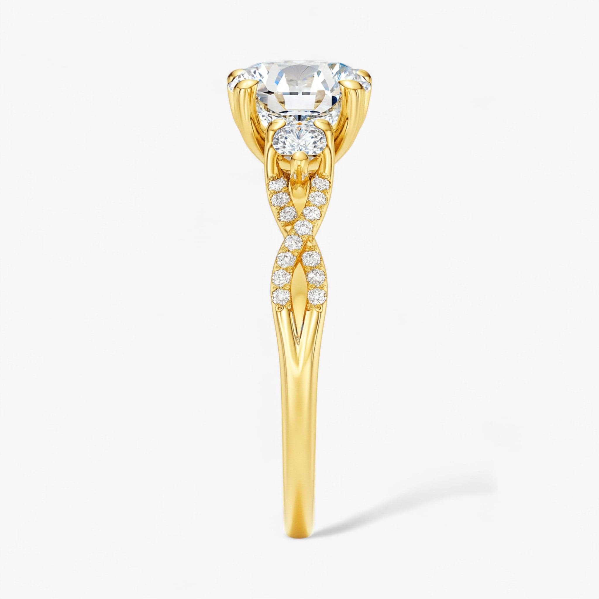 The Iconic 3-Stone Twisted Engagement Ring | Round
