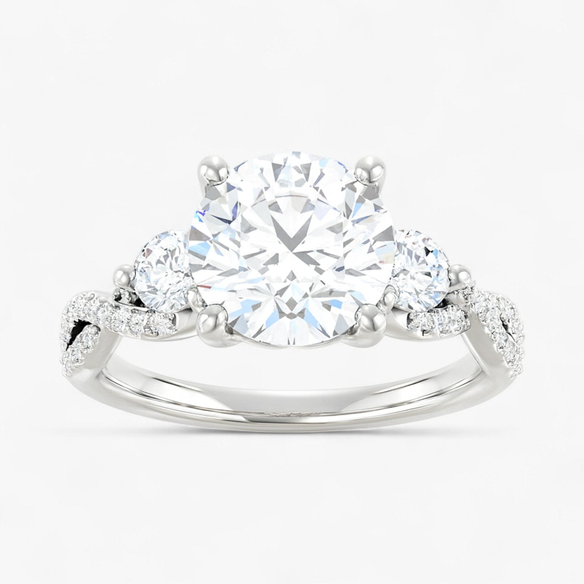 The Iconic 3-Stone Twisted Engagement Ring | Round