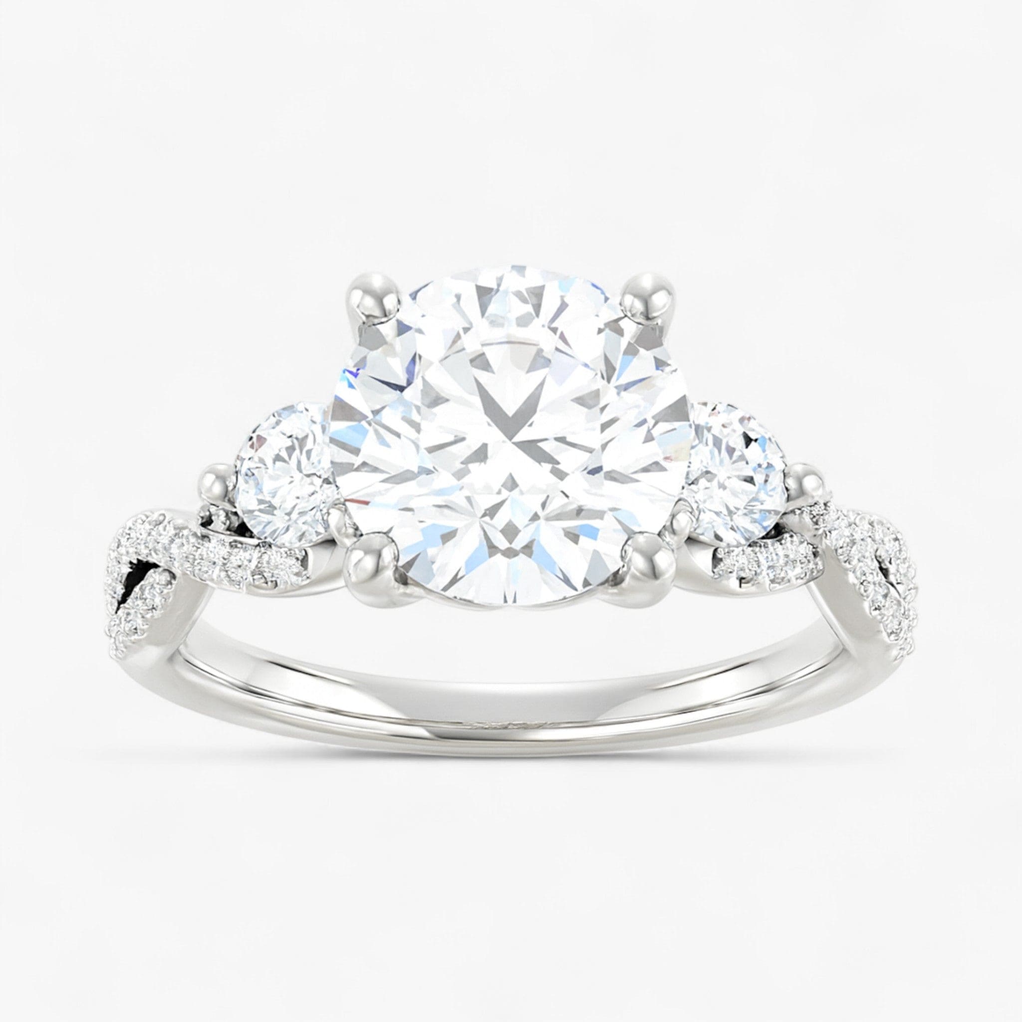 The Iconic 3-Stone Twisted Engagement Ring | Round