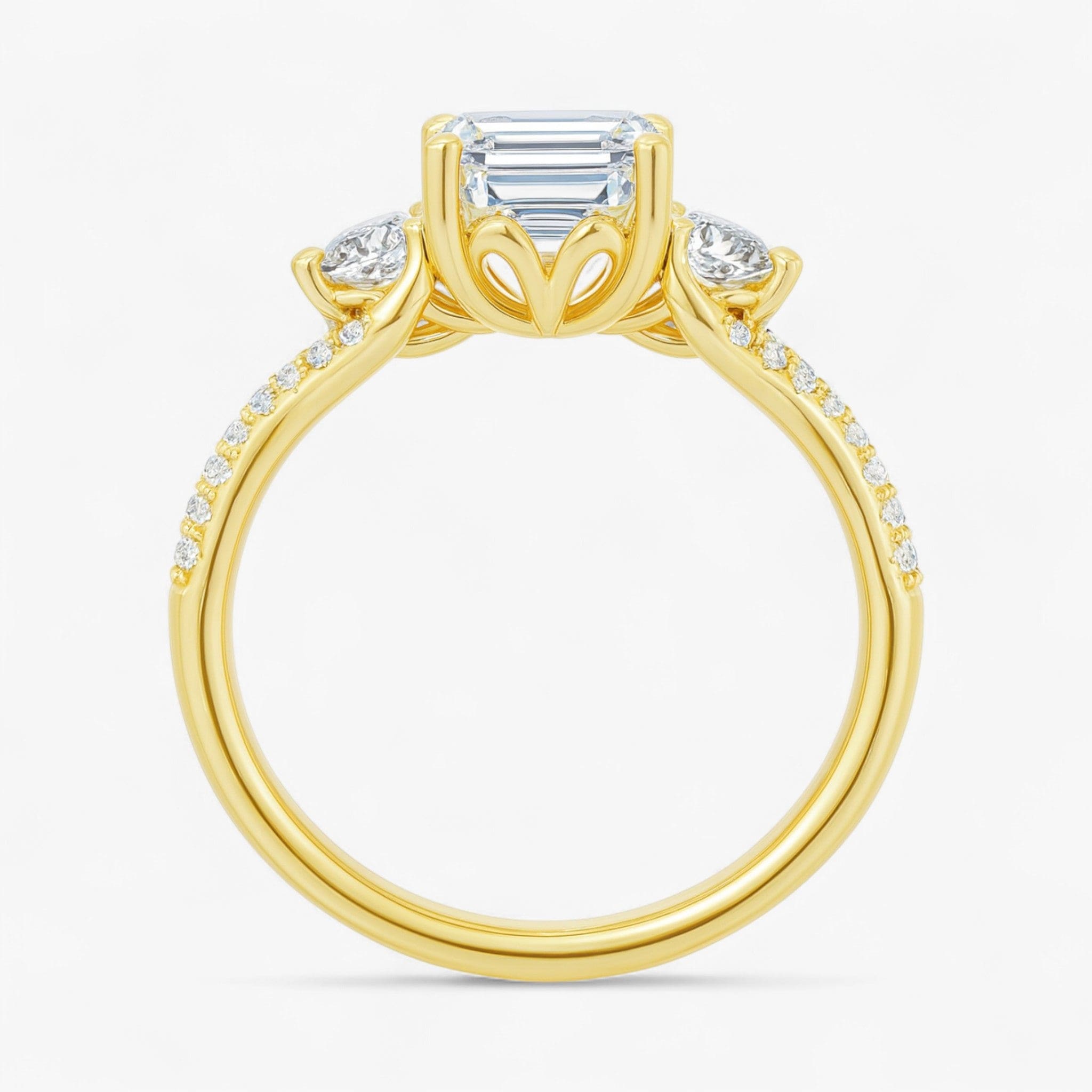 The Iconic 3-Stone Twisted Engagement Ring | Emerald