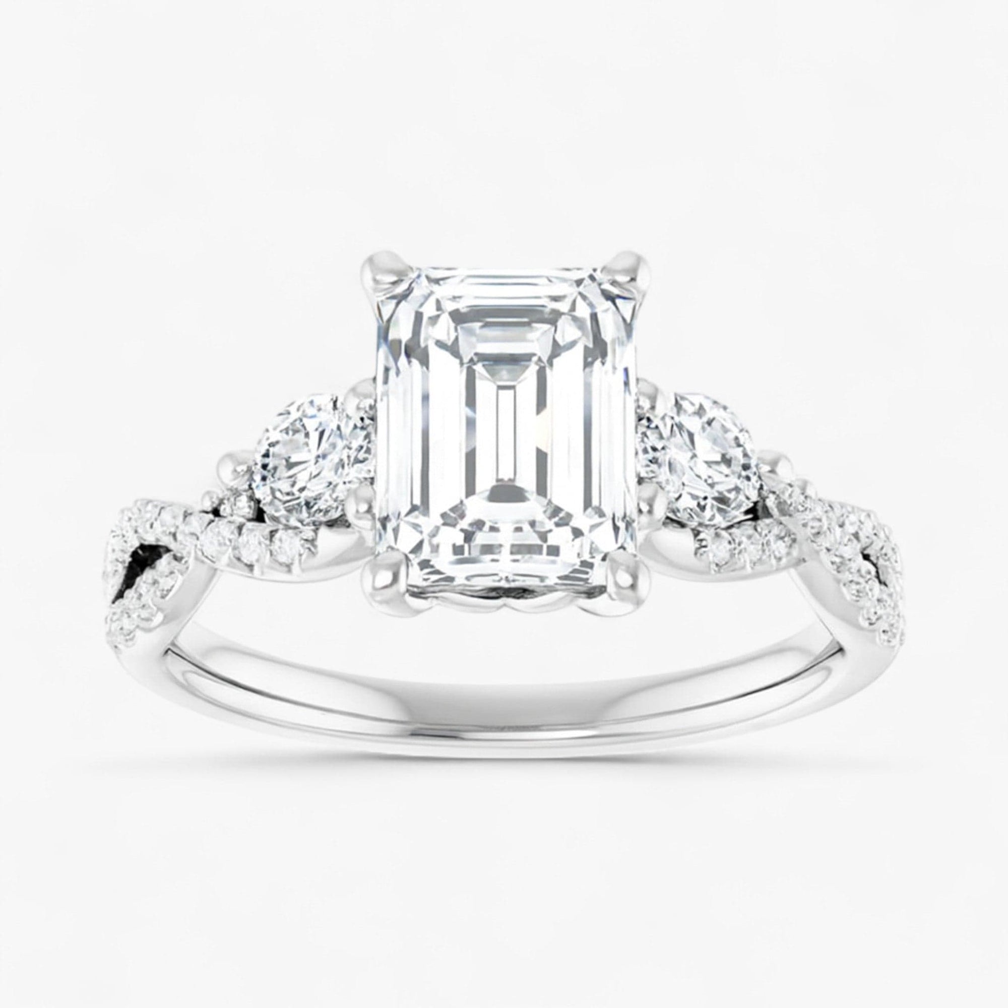 The Iconic 3-Stone Twisted Engagement Ring | Emerald