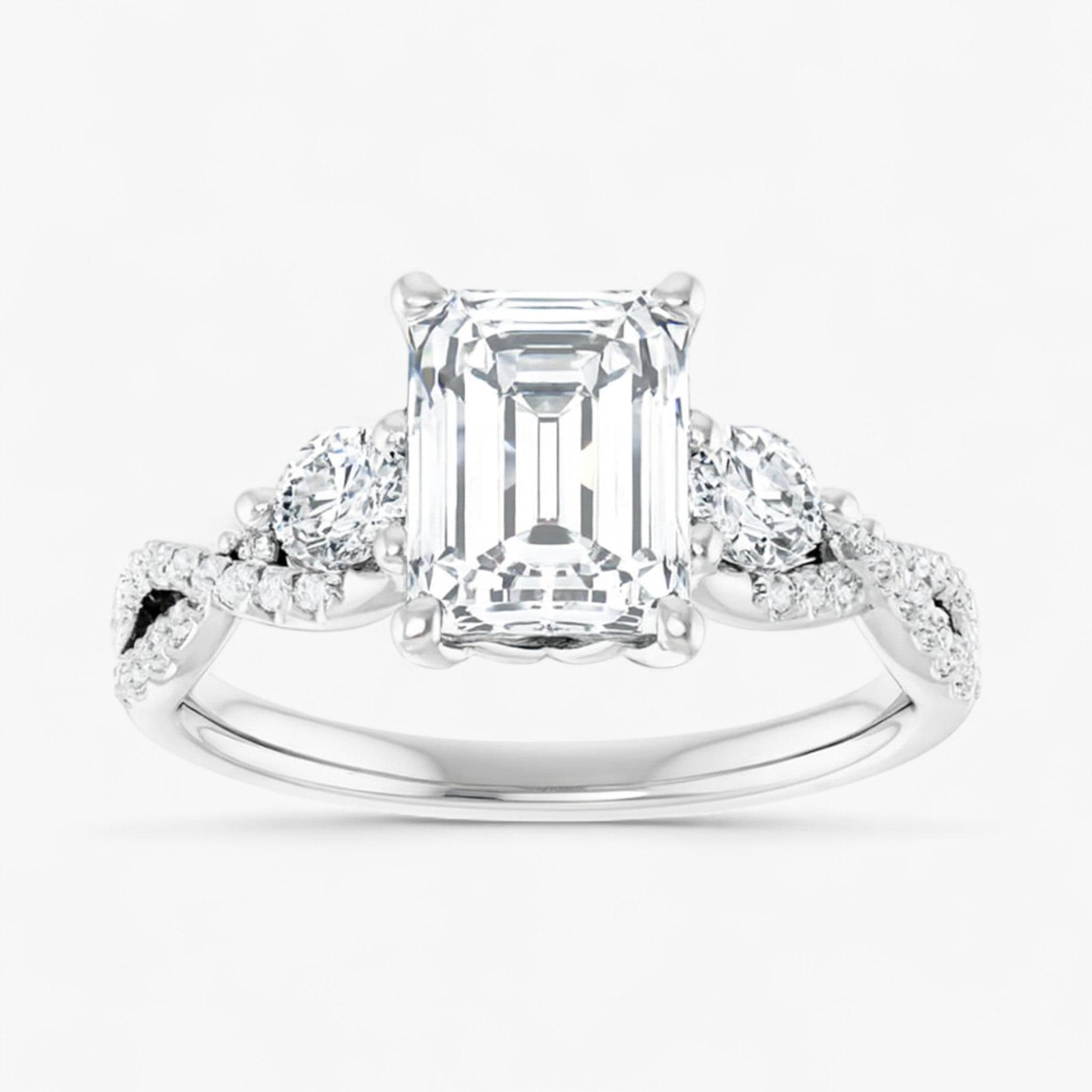 The Iconic 3-Stone Twisted Engagement Ring | Emerald