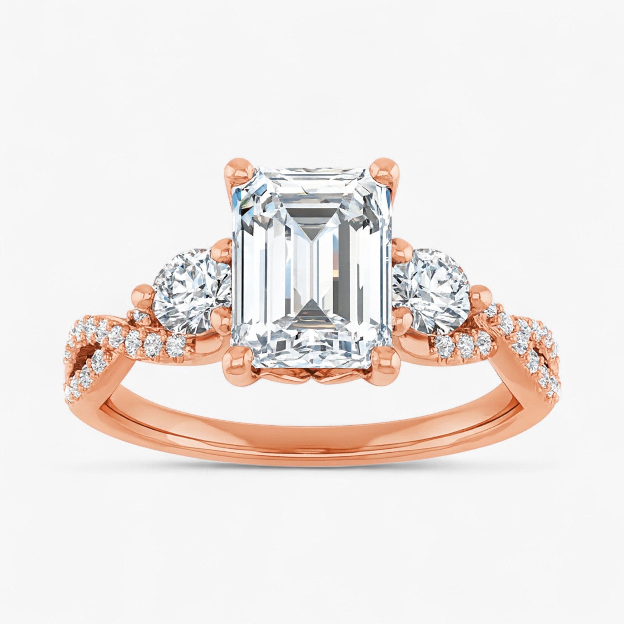The Iconic 3-Stone Twisted Engagement Ring | Emerald