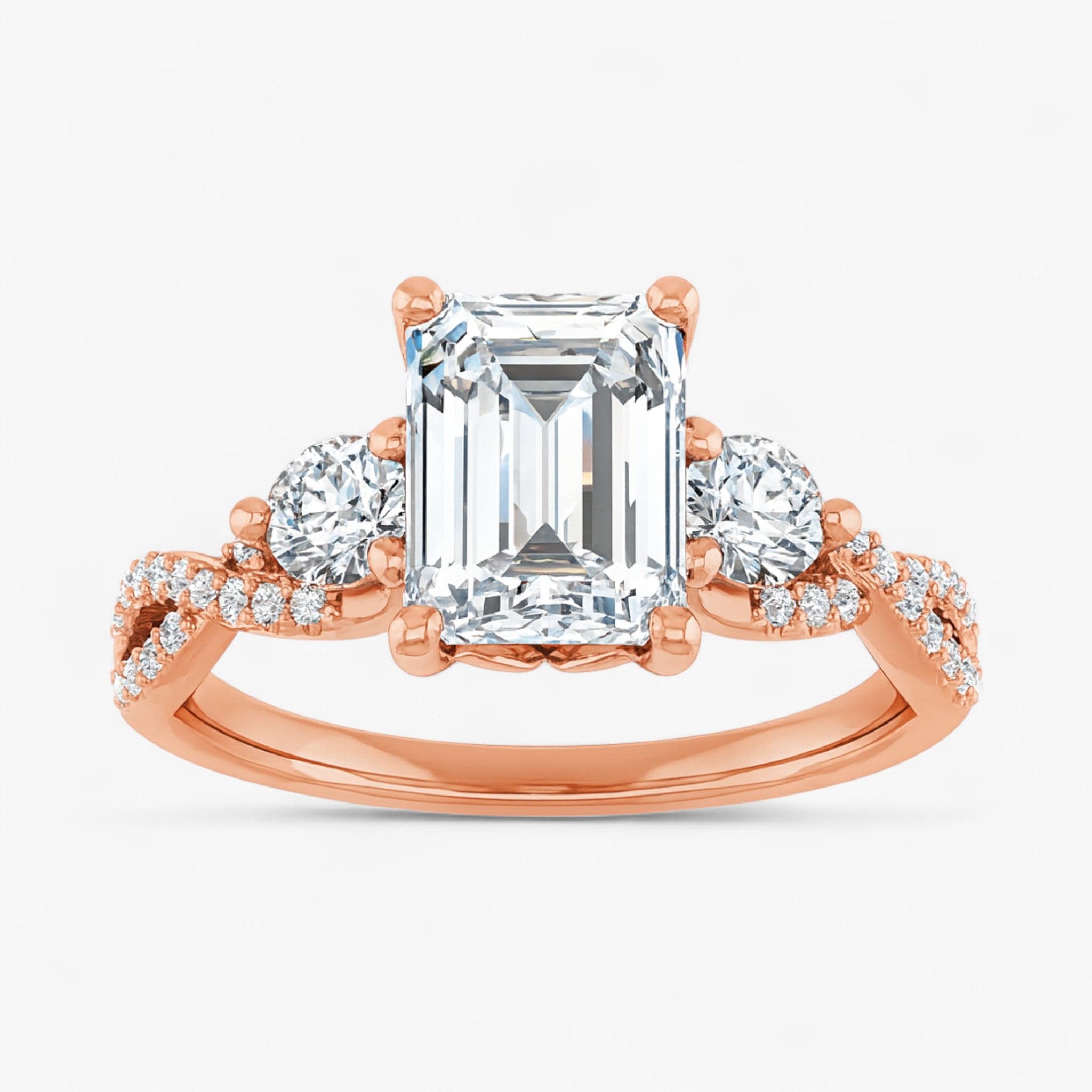 The Iconic 3-Stone Twisted Engagement Ring | Emerald