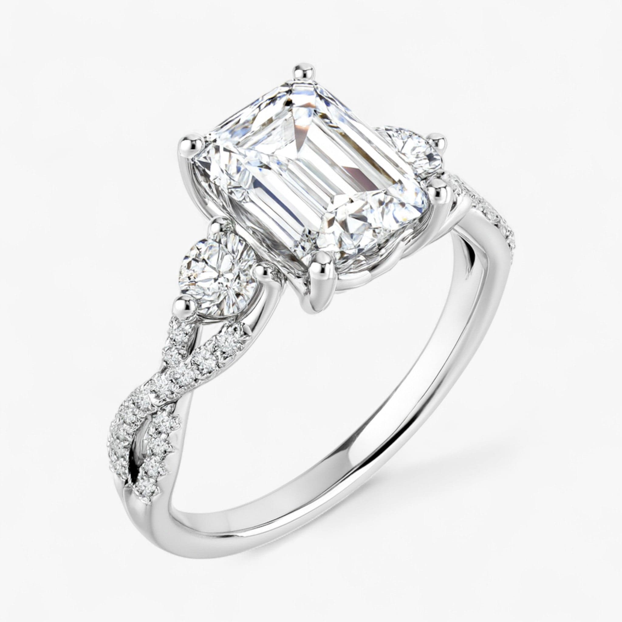 The Iconic 3-Stone Twisted Engagement Ring | Emerald