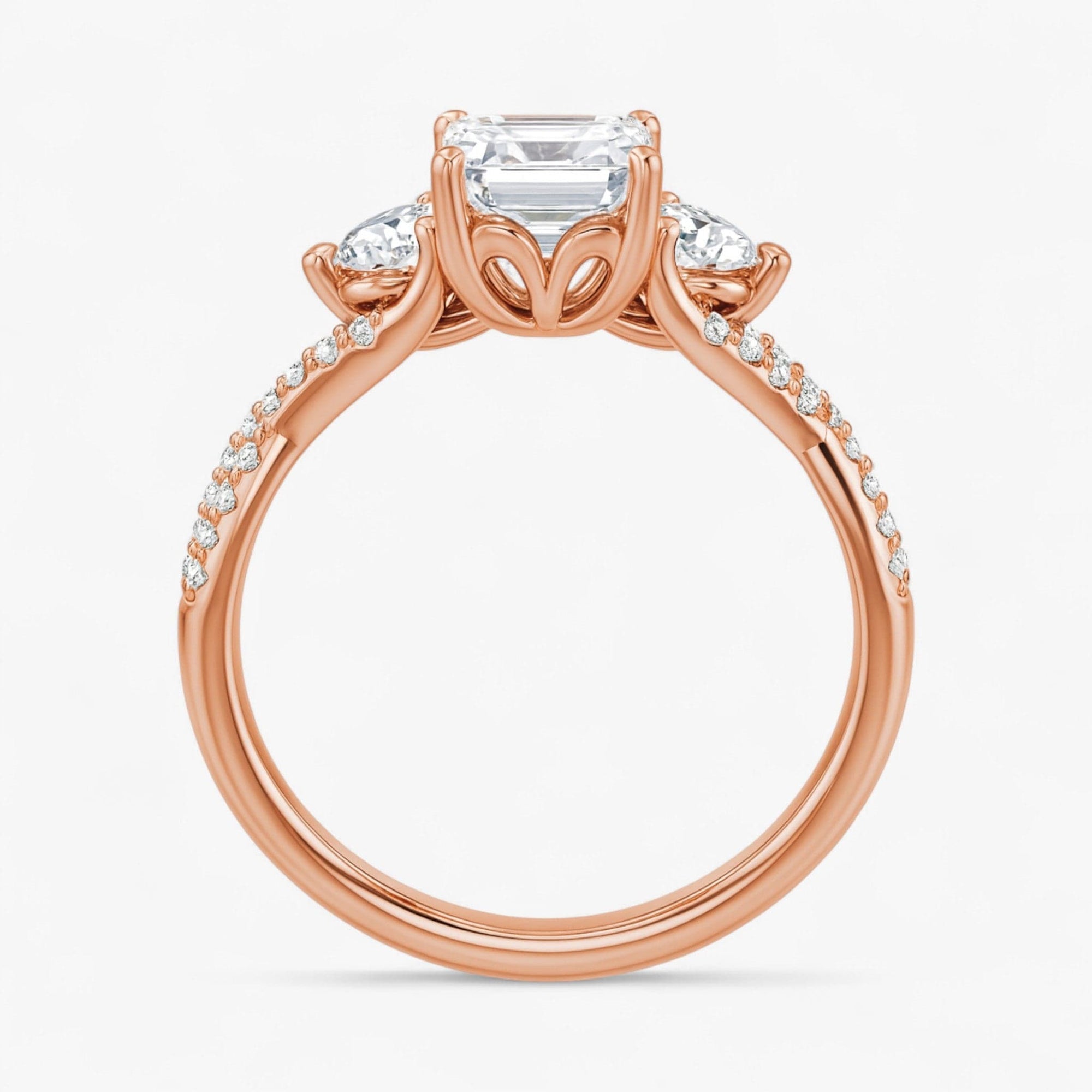 The Iconic 3-Stone Twisted Engagement Ring | Emerald
