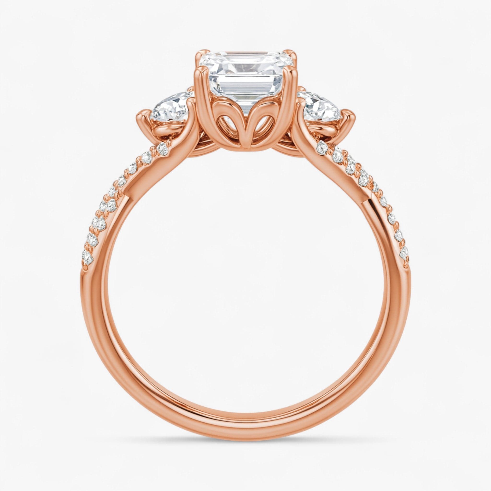 The Iconic 3-Stone Twisted Engagement Ring | Emerald