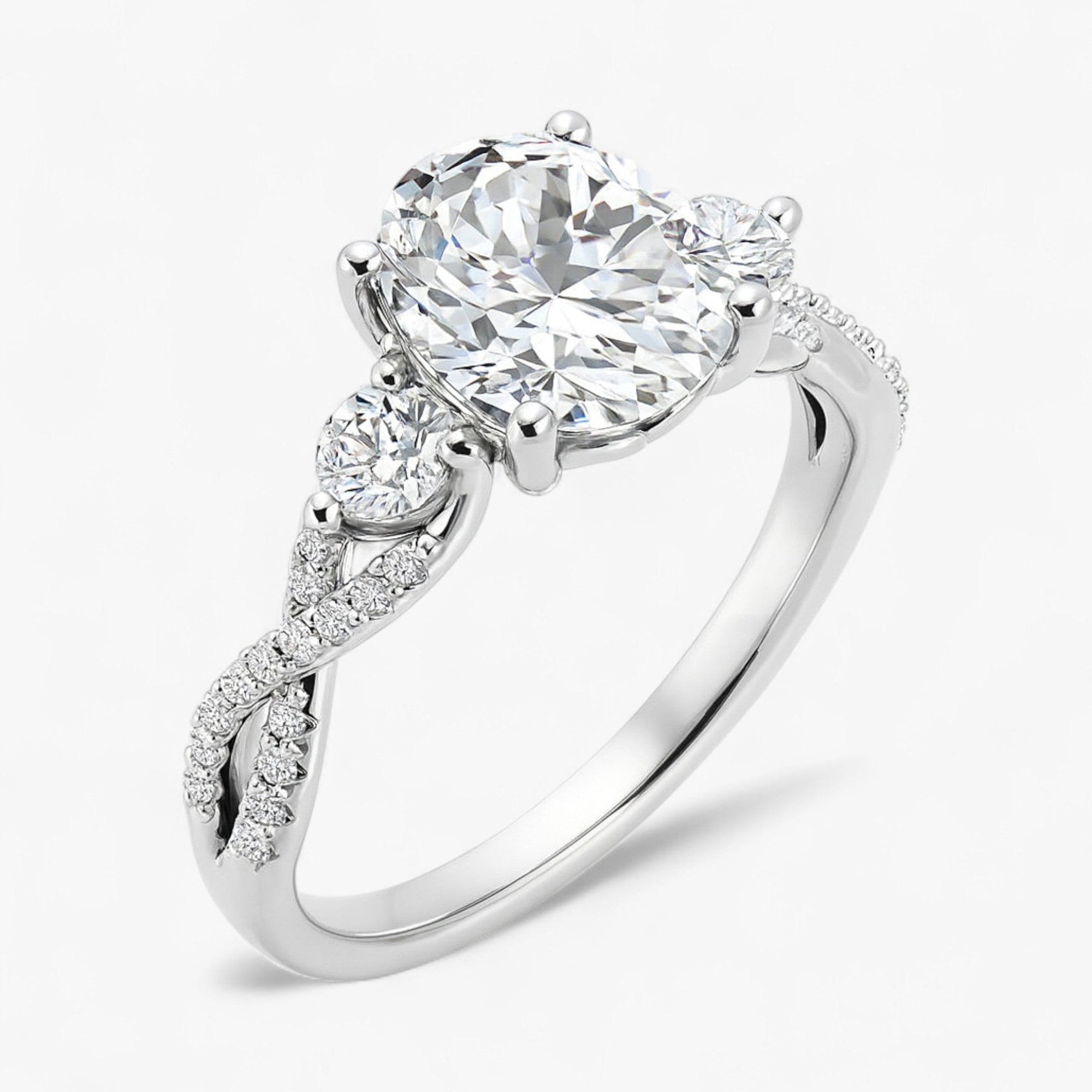 The Iconic 3-Stone Twisted Engagement Ring | Oval