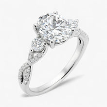 The Iconic 3-Stone Twisted Engagement Ring | Oval