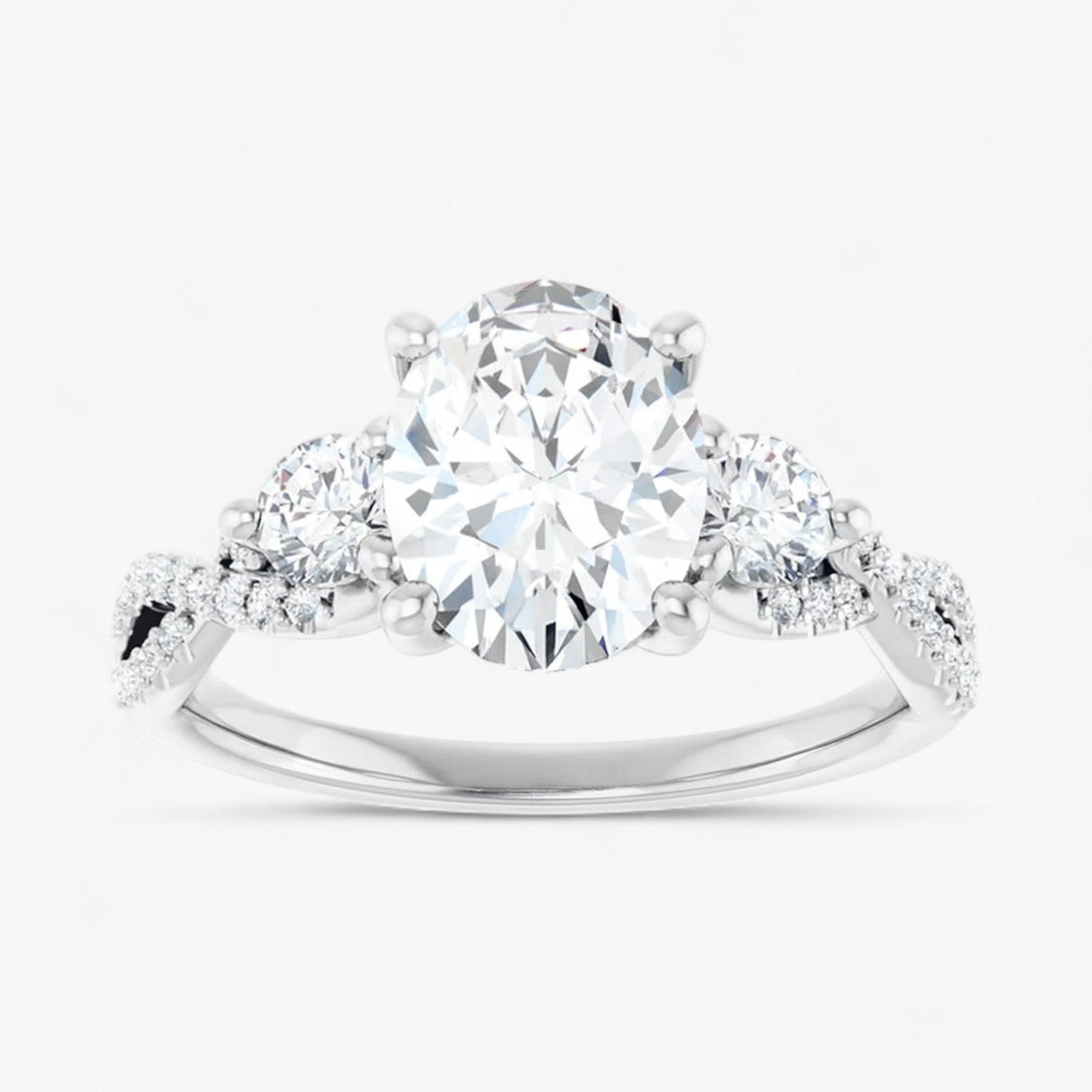 The Iconic 3-Stone Twisted Engagement Ring | Oval