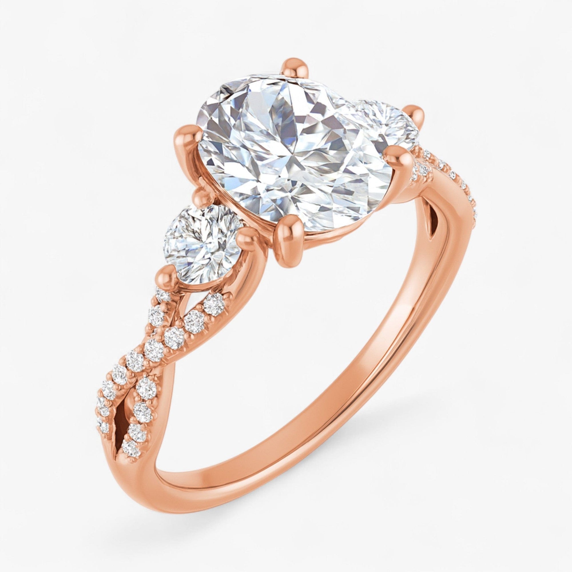 The Iconic 3-Stone Twisted Engagement Ring | Oval