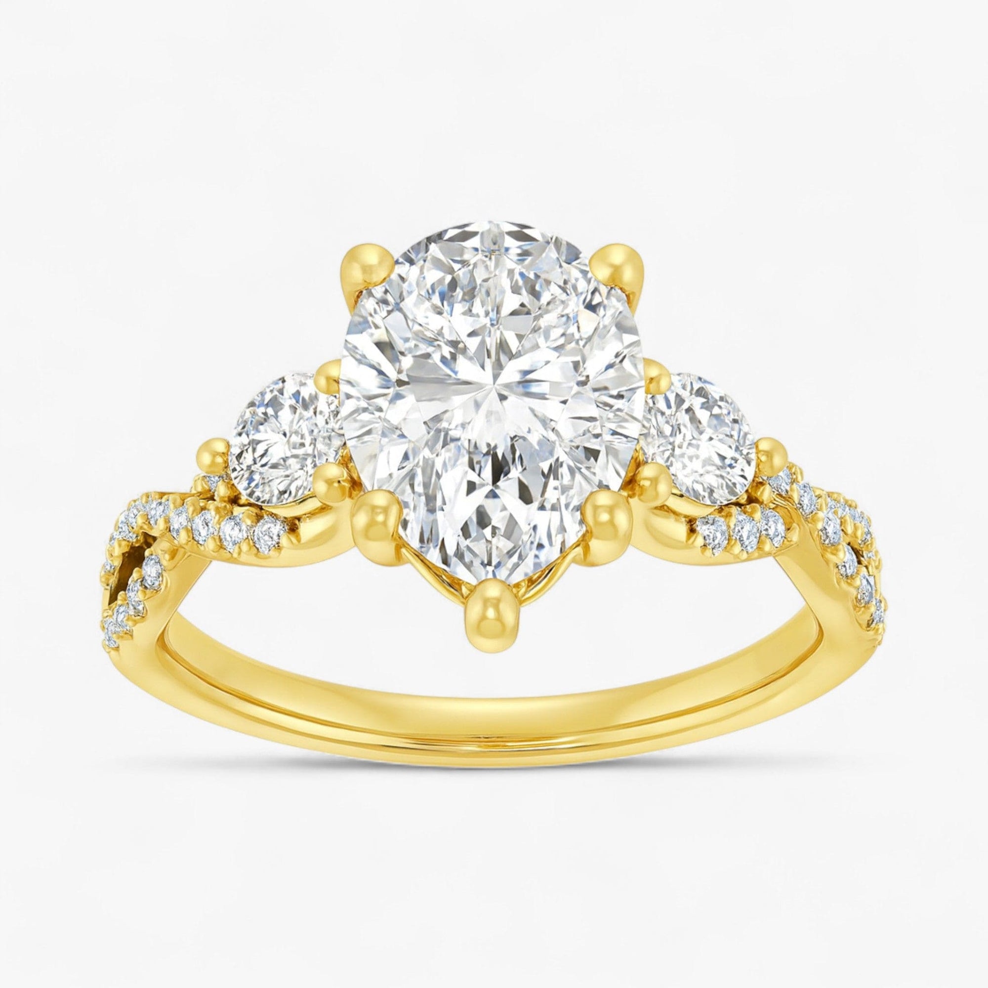 The Iconic 3-Stone Twisted Engagement Ring | Pear
