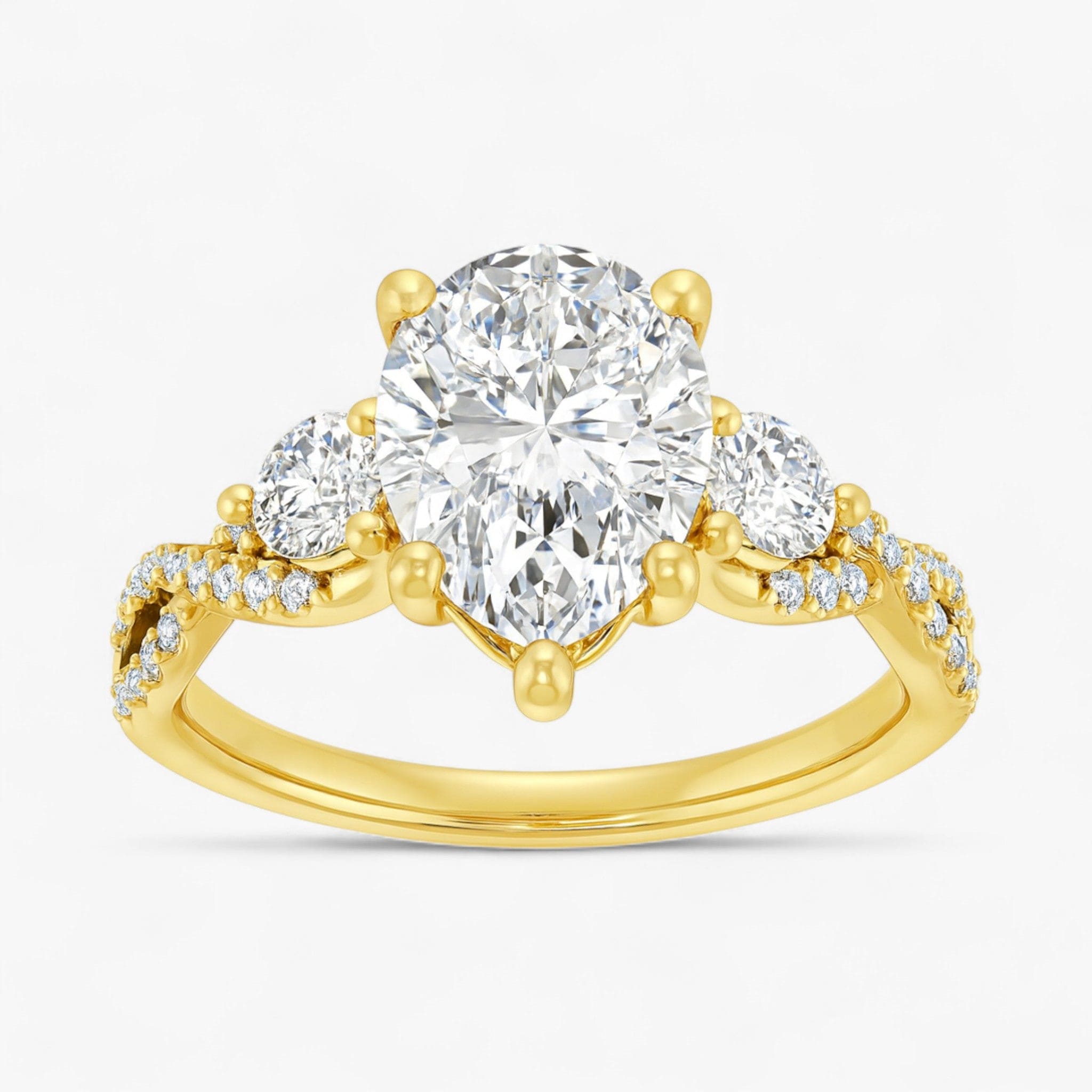 The Iconic 3-Stone Twisted Engagement Ring | Pear