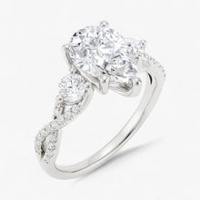 The Iconic 3-Stone Twisted Engagement Ring | Pear
