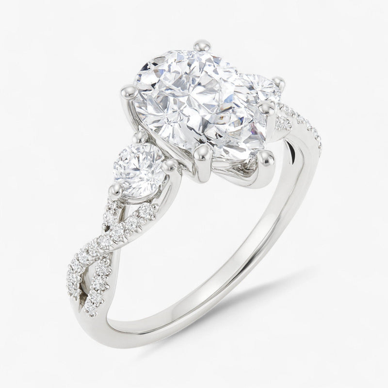 The Iconic 3-Stone Twisted Engagement Ring | Pear