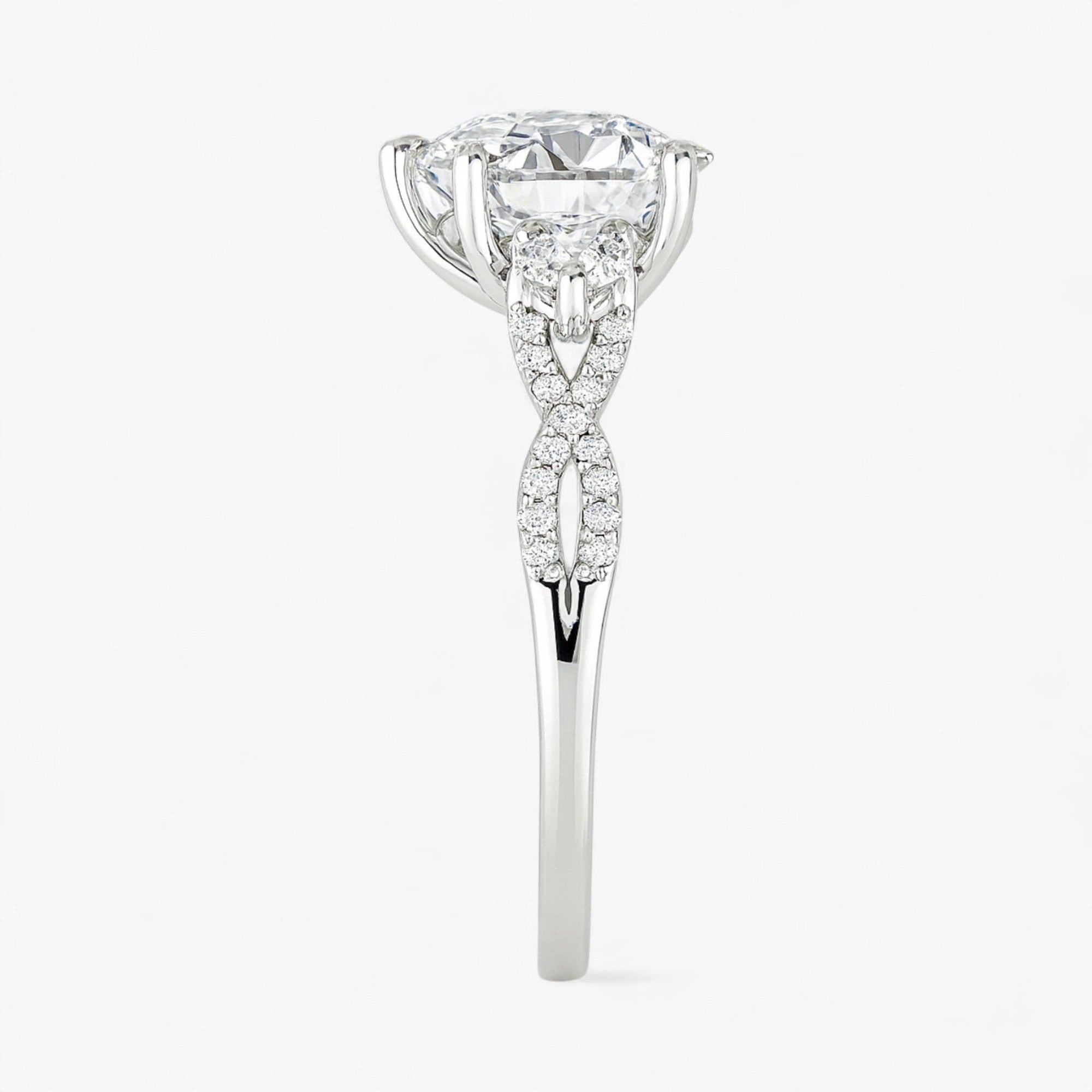 The Iconic 3-Stone Twisted Engagement Ring | Pear