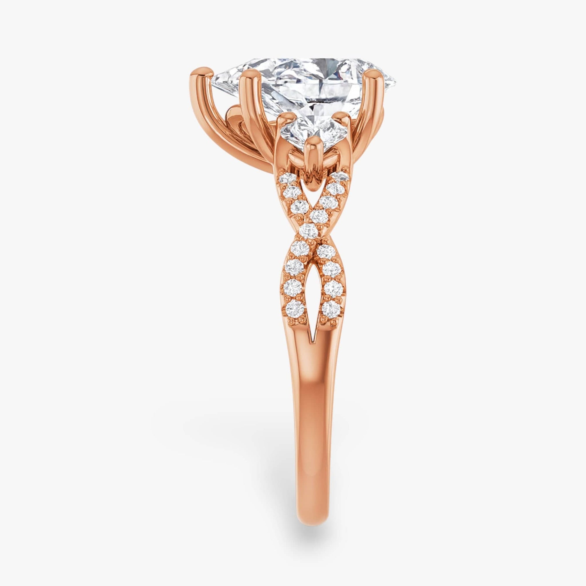 The Iconic 3-Stone Twisted Engagement Ring | Pear