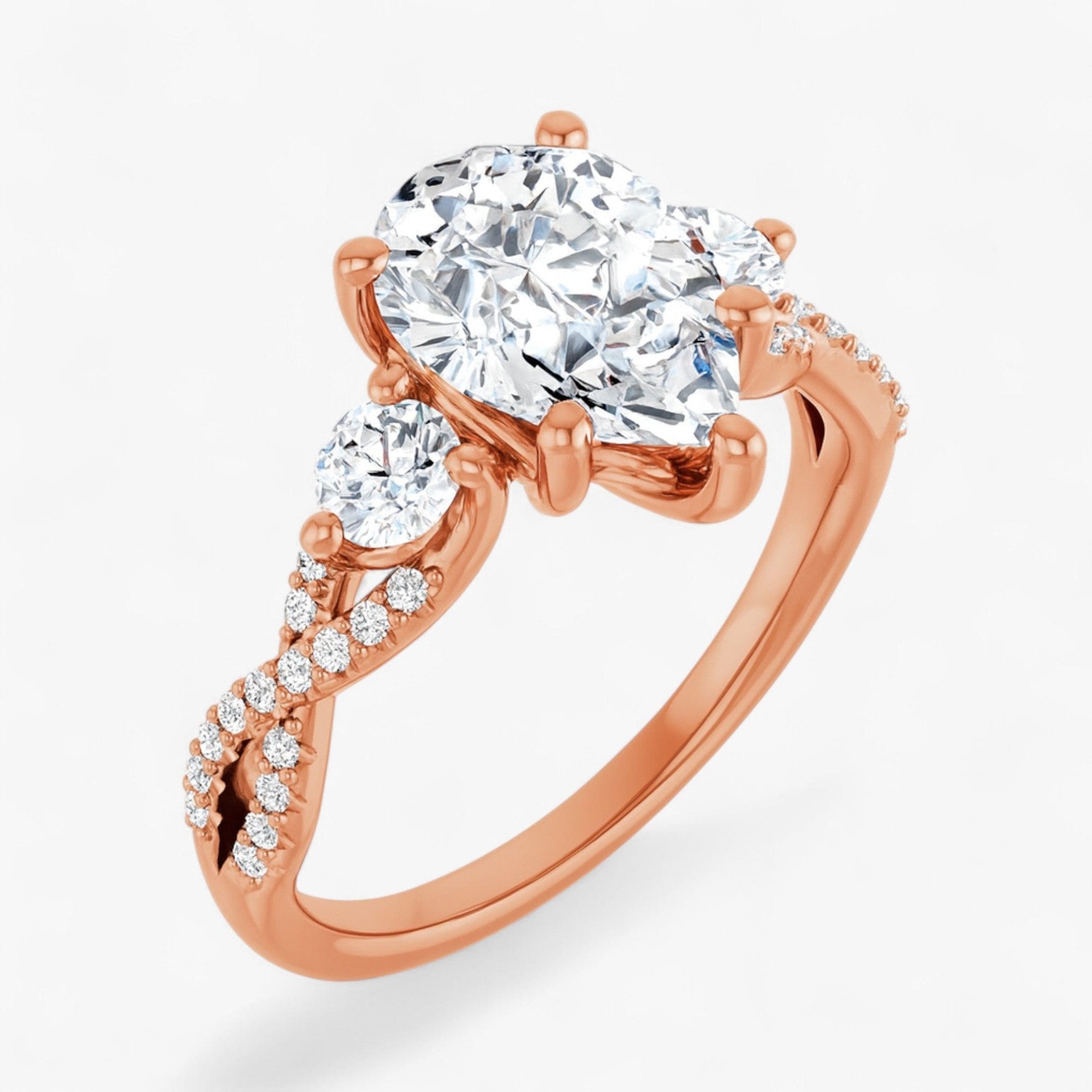 The Iconic 3-Stone Twisted Engagement Ring | Pear