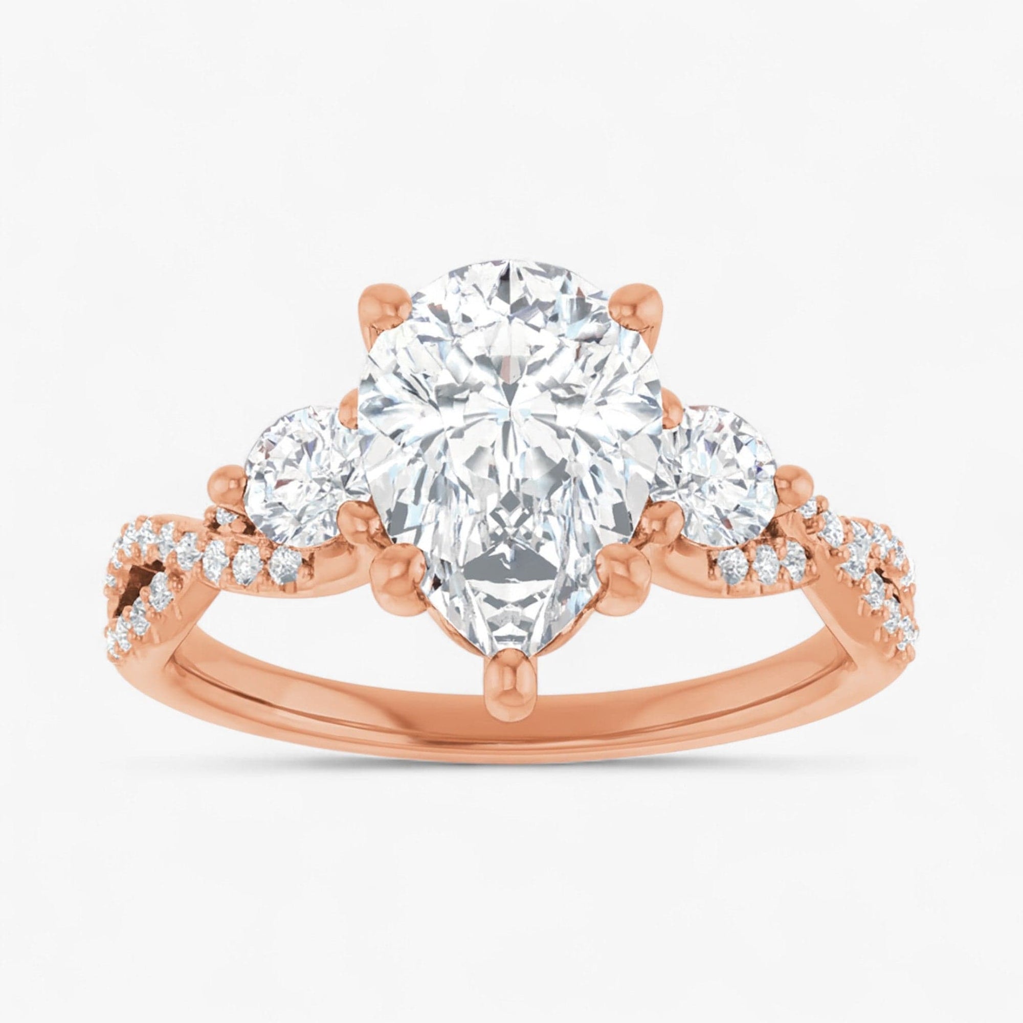 The Iconic 3-Stone Twisted Engagement Ring | Pear