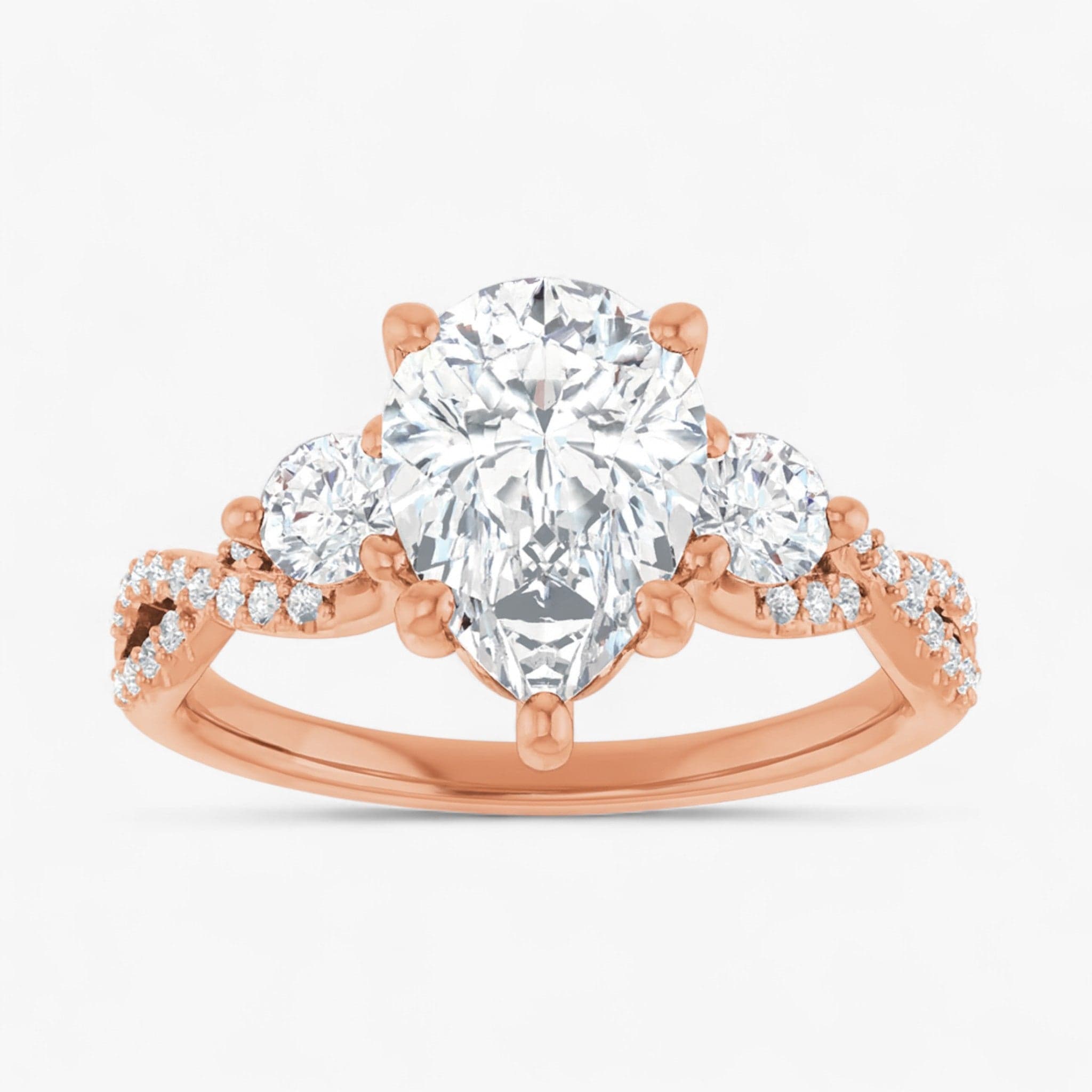 The Iconic 3-Stone Twisted Engagement Ring | Pear