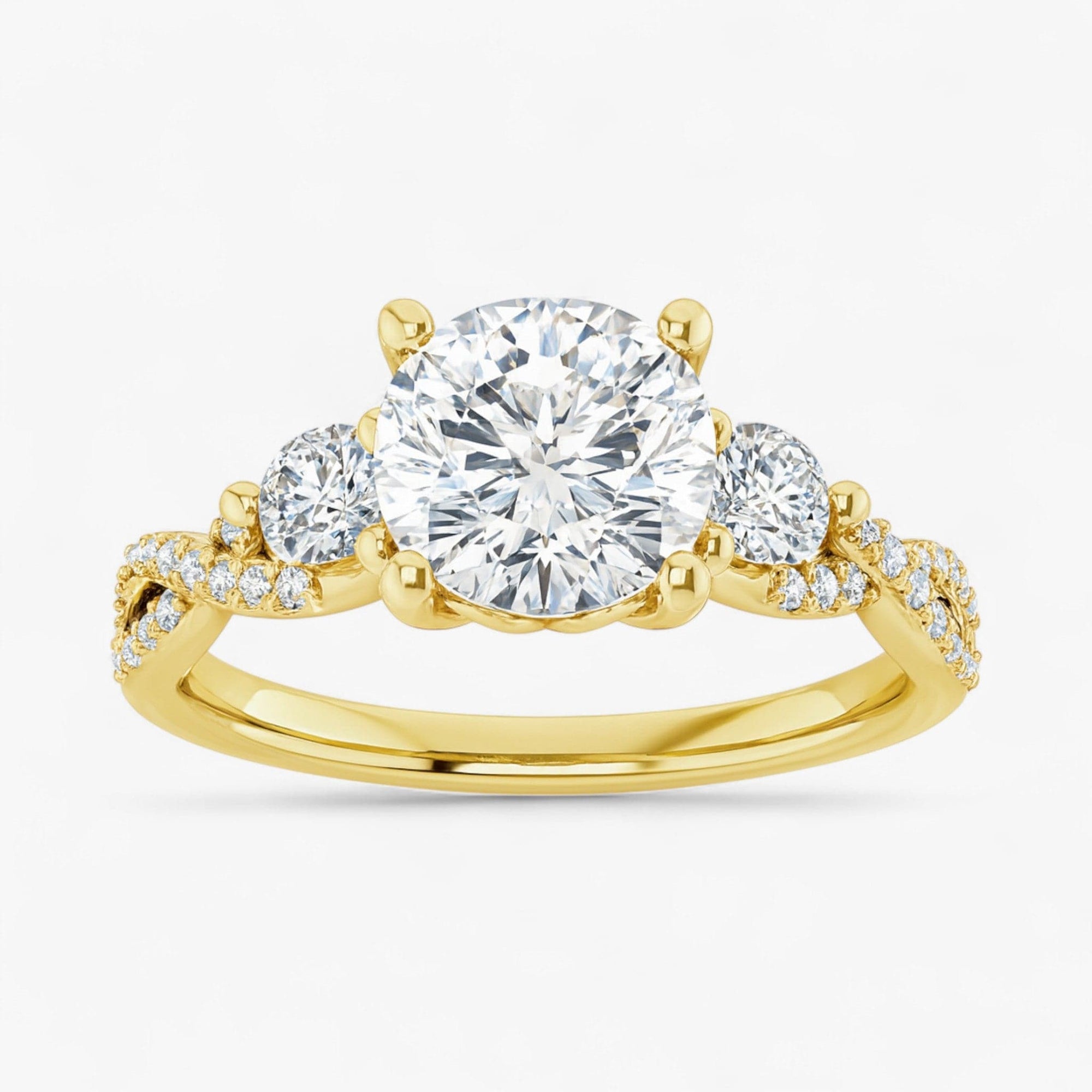 The Iconic 3-Stone Twisted Engagement Ring | Cushion