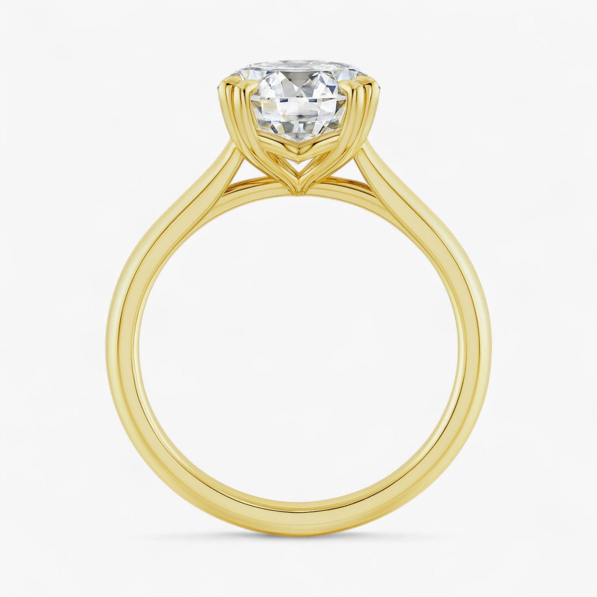 The Double Claw Solitaire Engagement Ring | Emerald
