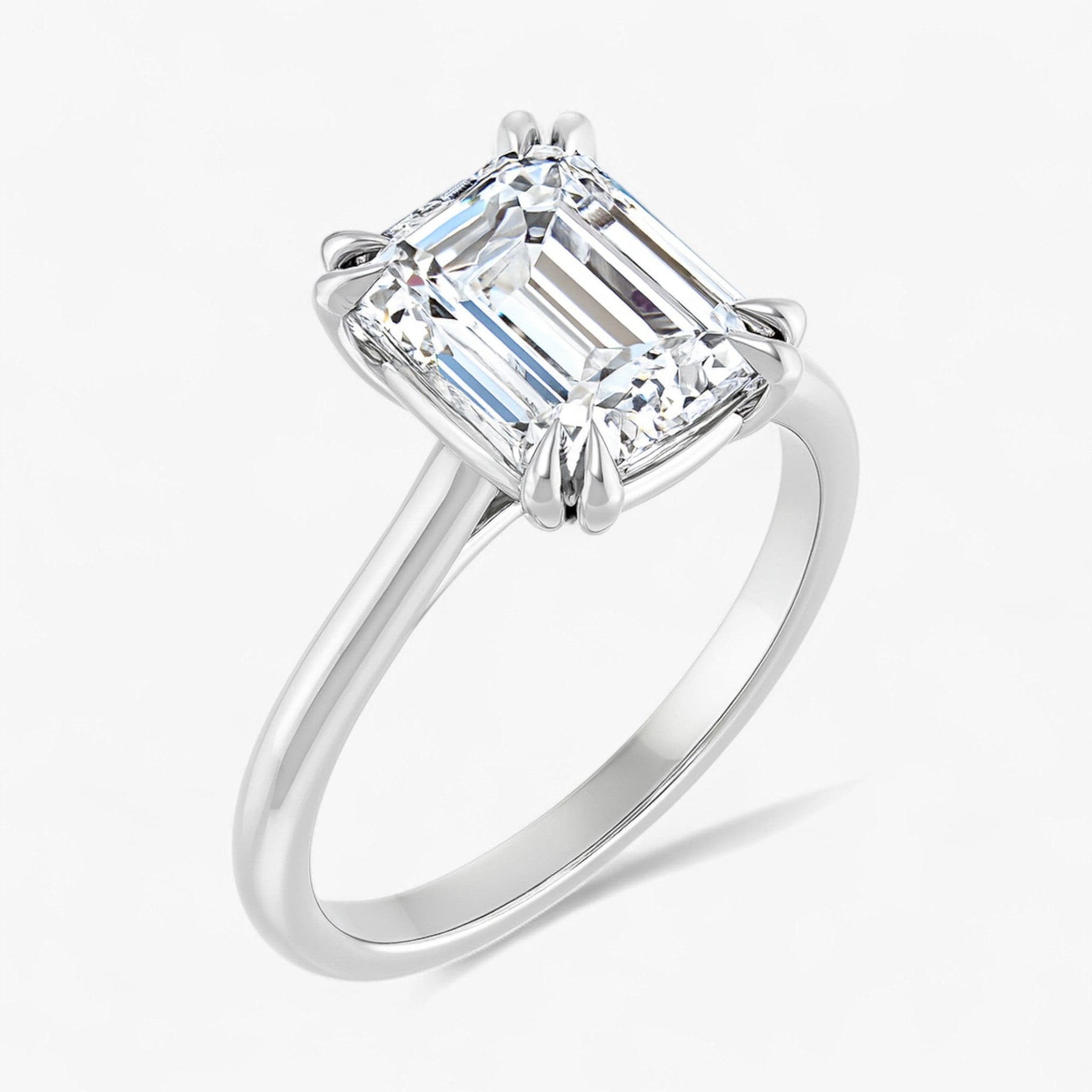 The Double Claw Solitaire Engagement Ring | Emerald
