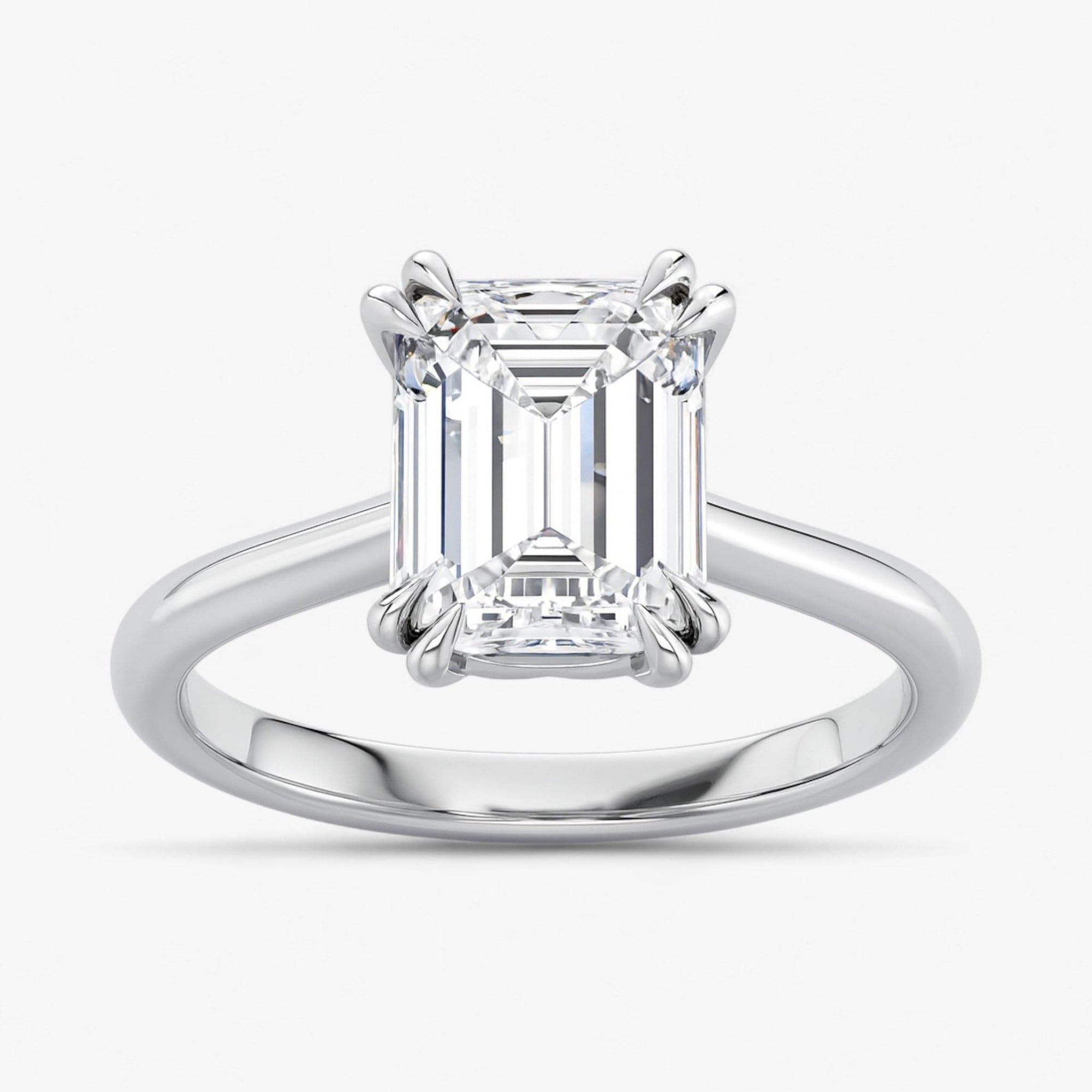 The Double Claw Solitaire Engagement Ring | Emerald