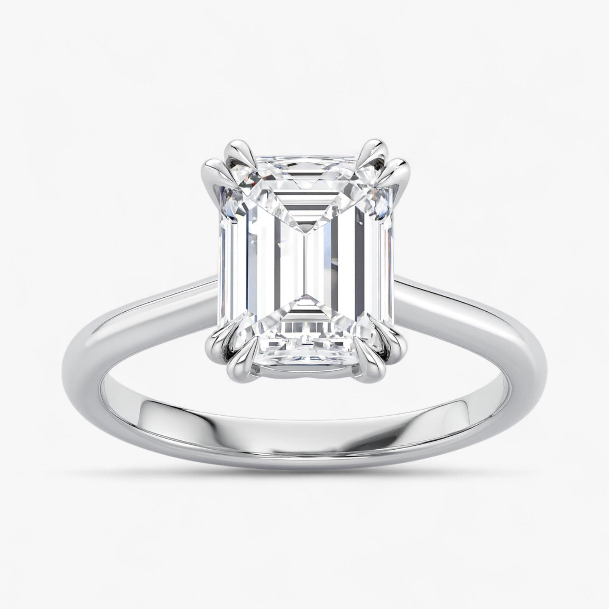 The Double Claw Solitaire Engagement Ring | Emerald