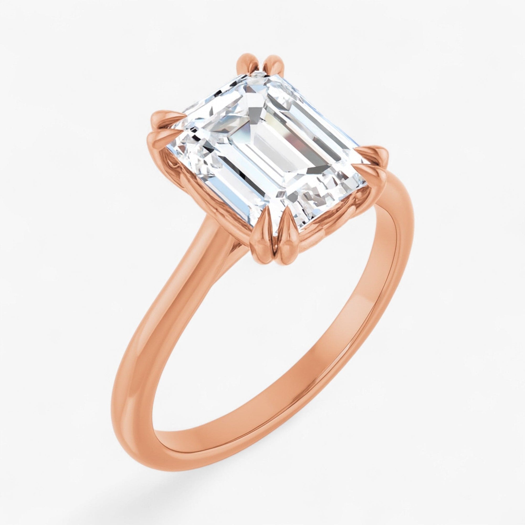 The Double Claw Solitaire Engagement Ring | Emerald