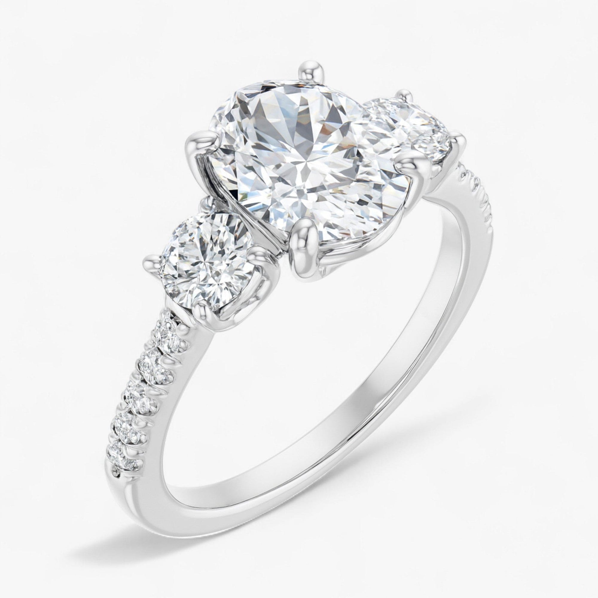The Iconic 3-Stone Pavé Engagement Ring | Oval