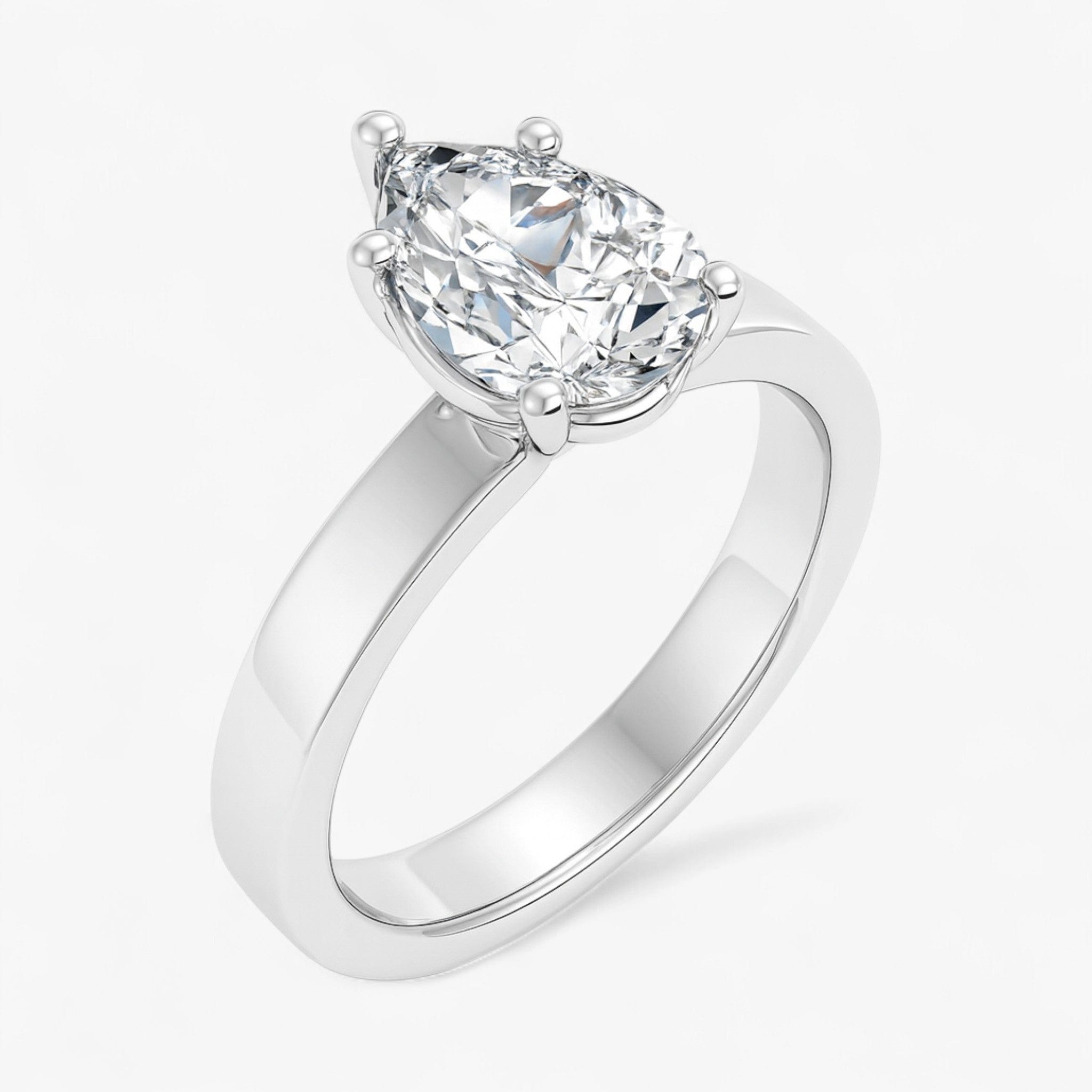 The Cigar Band Solitaire Engagement Ring | Pear