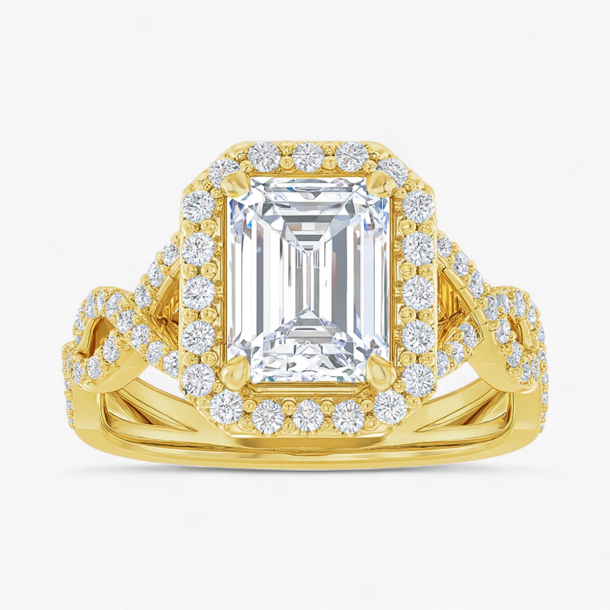 The Iconic Twisted Halo Engagement Ring | Emerald