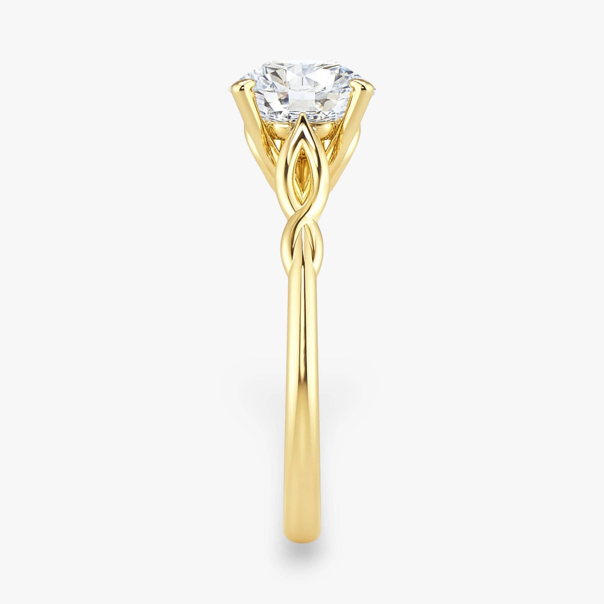 The Elegant Twisted Solitaire Engagement Ring | Round
