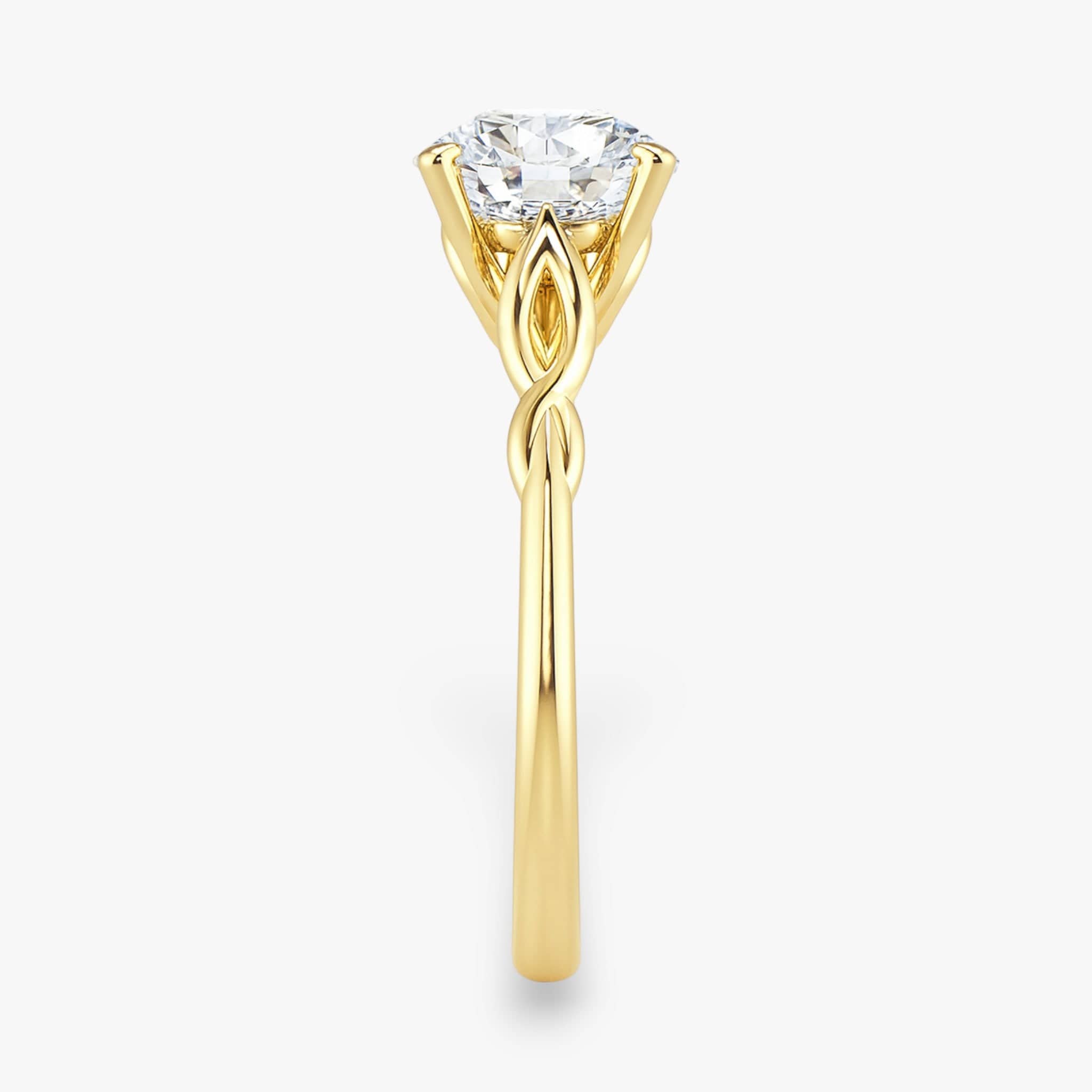 The Elegant Twisted Solitaire Engagement Ring | Round