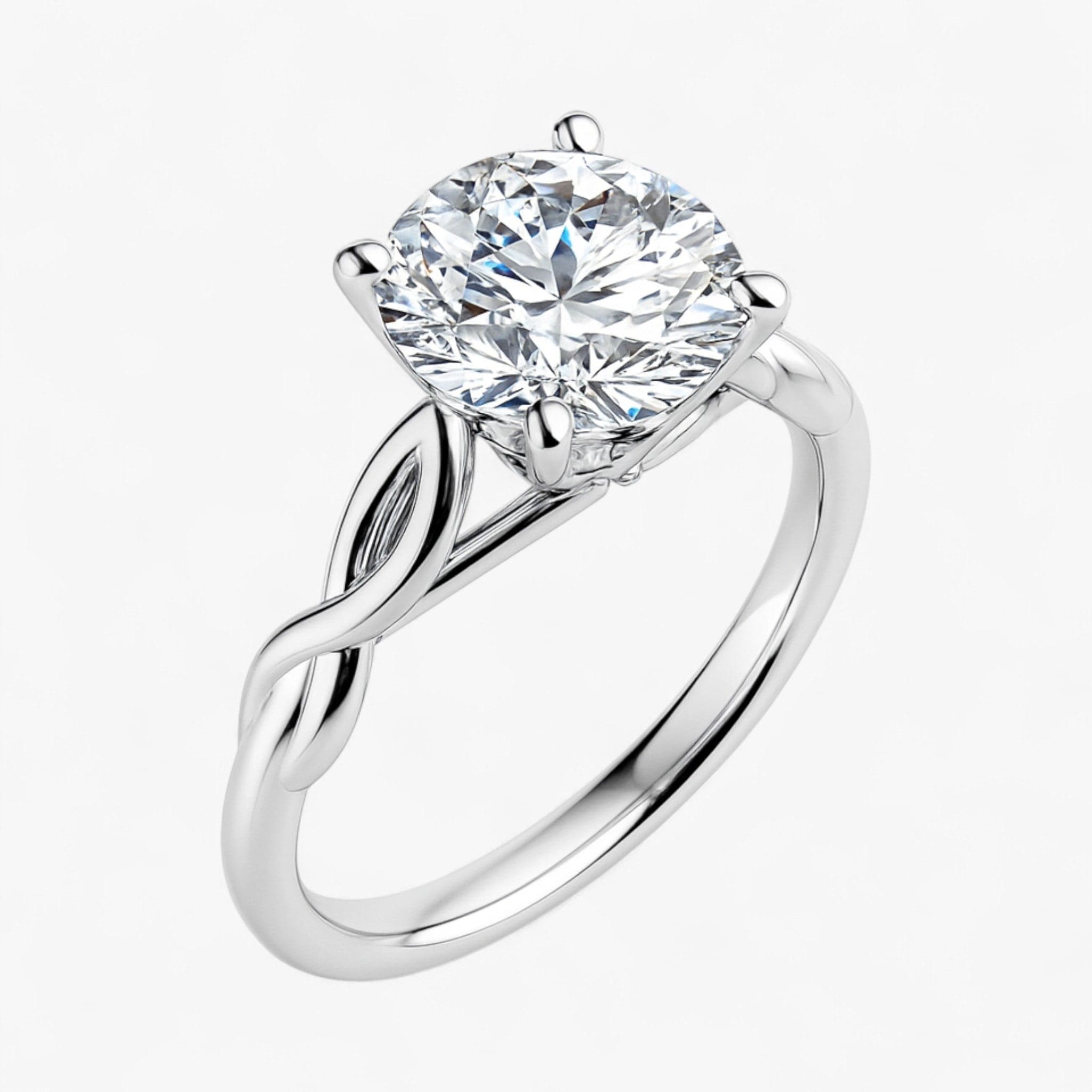 The Elegant Twisted Solitaire Engagement Ring | Round