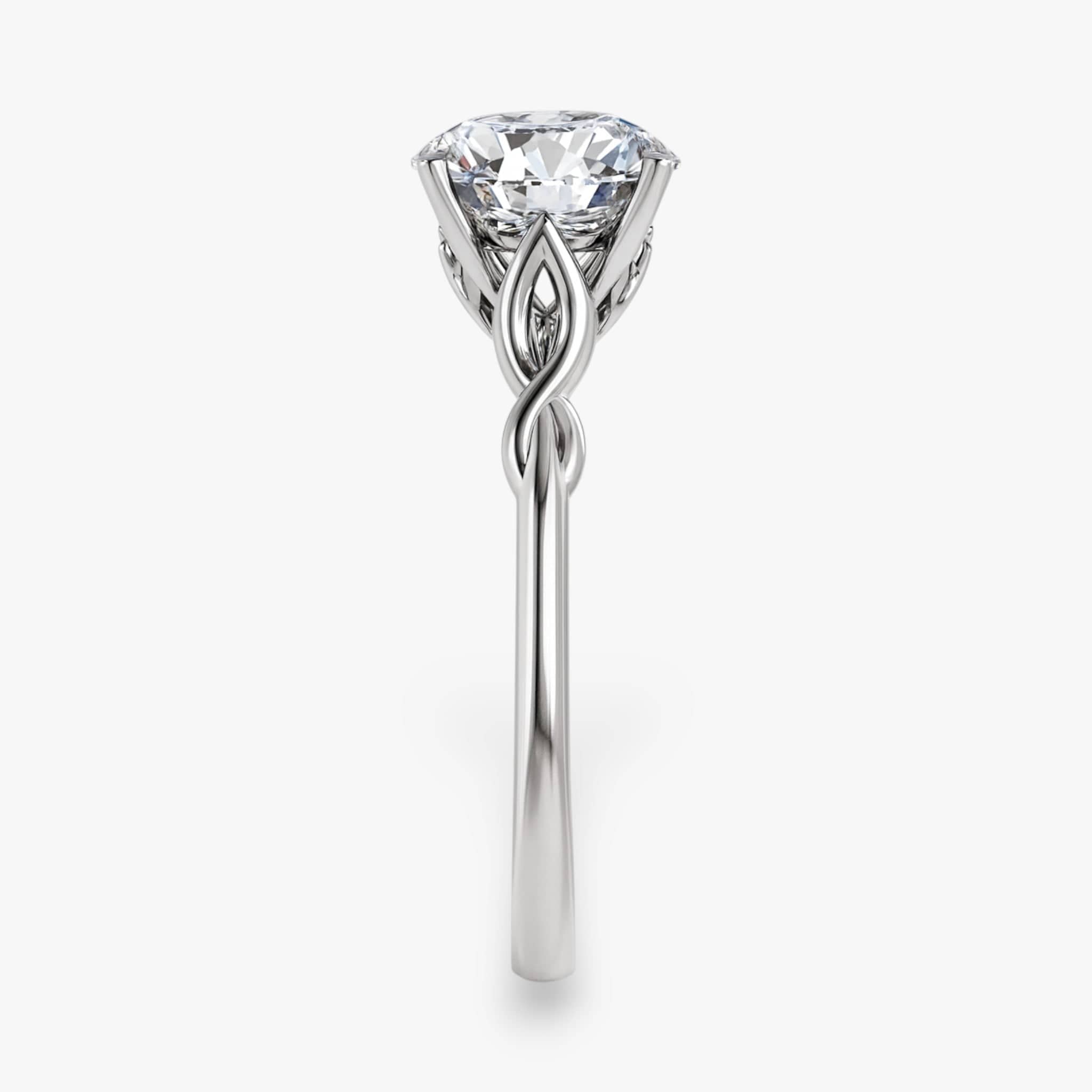 The Elegant Twisted Solitaire Engagement Ring | Round