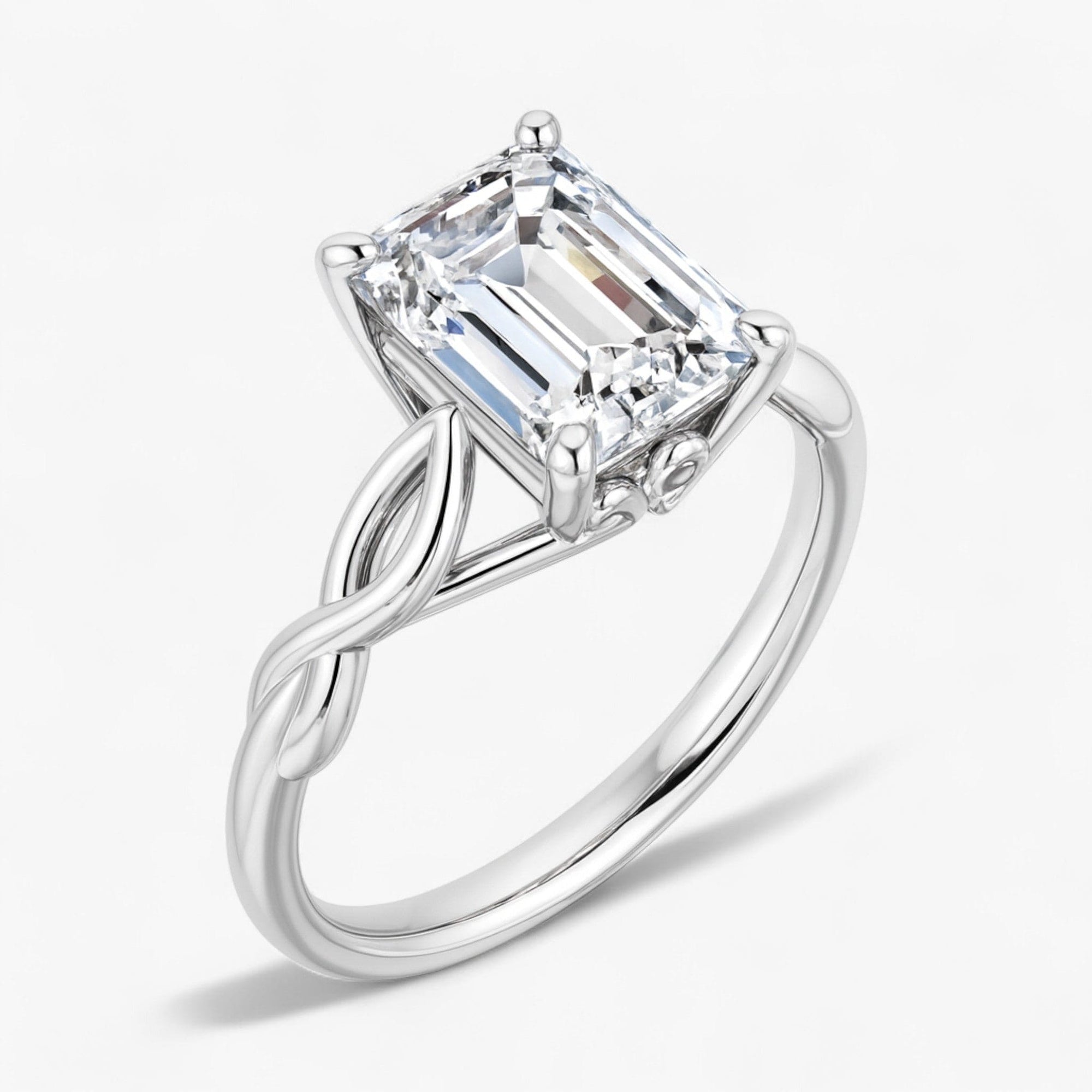 The Elegant Twisted Solitaire Engagement Ring | Emerald