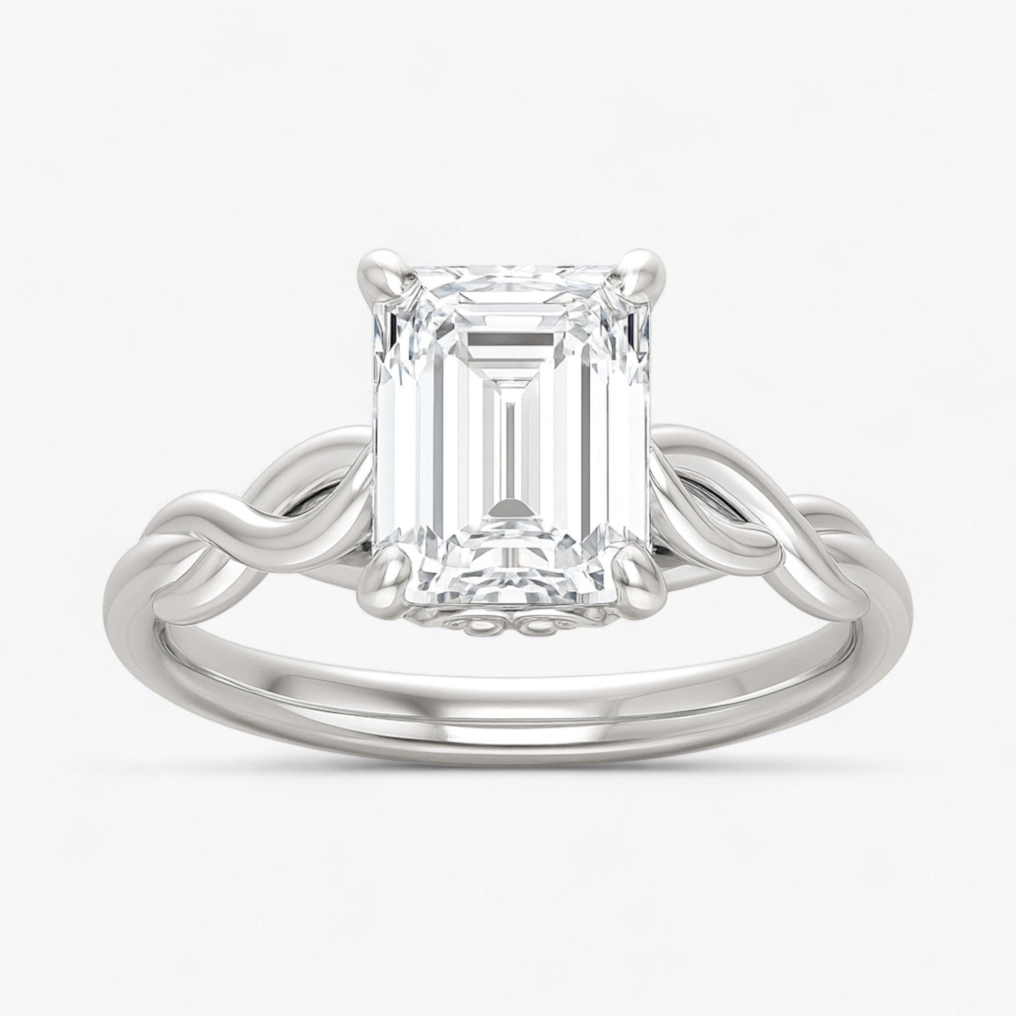 The Elegant Twisted Solitaire Engagement Ring | Emerald
