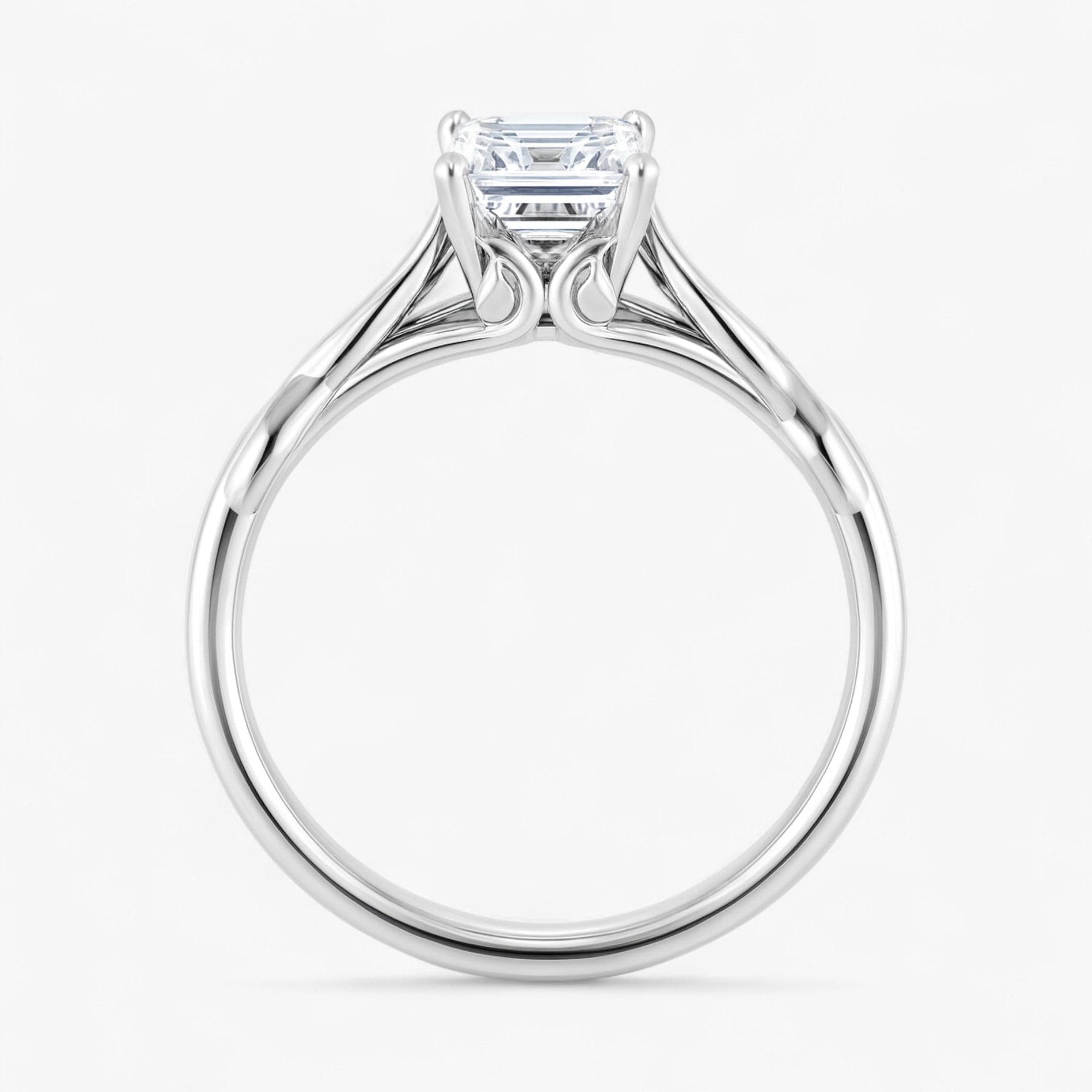 The Elegant Twisted Solitaire Engagement Ring | Emerald