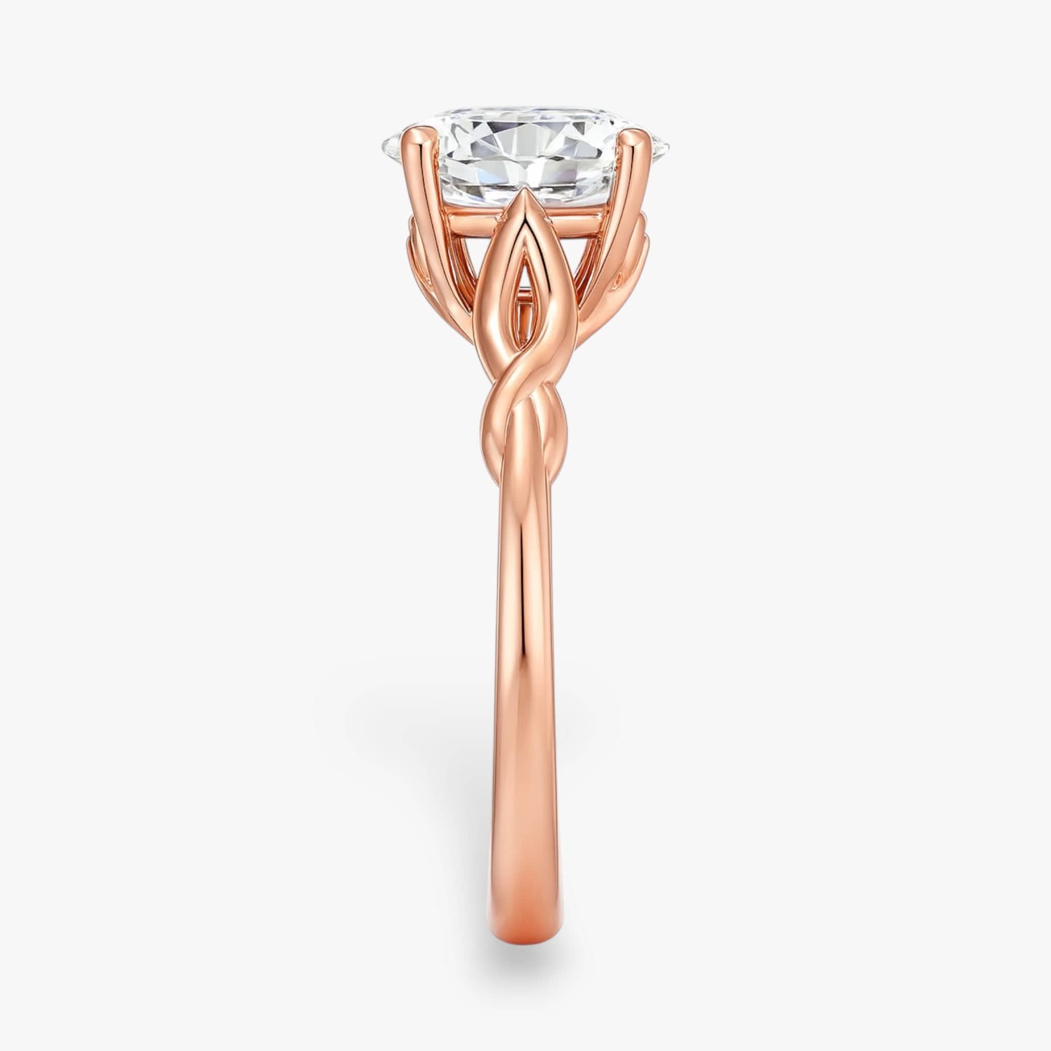 The Elegant Twisted Solitaire Engagement Ring | Oval