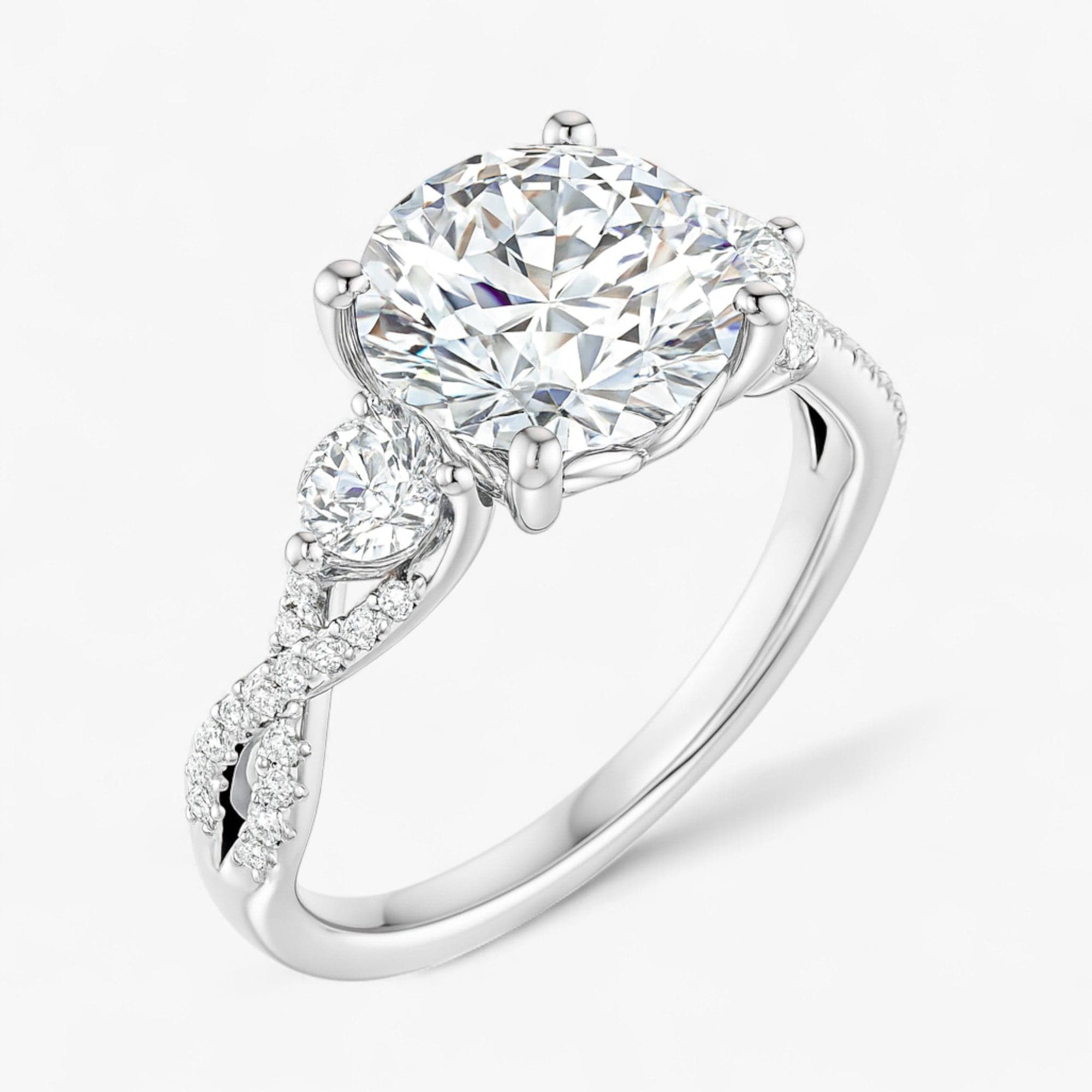 The Iconic 3-Stone Twisted Engagement Ring | Round