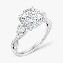 The Iconic 3-Stone Twisted Engagement Ring | Round