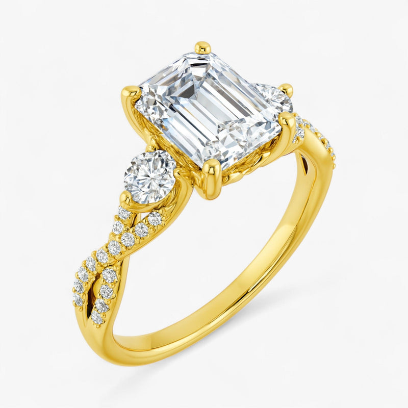 The Iconic 3-Stone Twisted Engagement Ring | Emerald