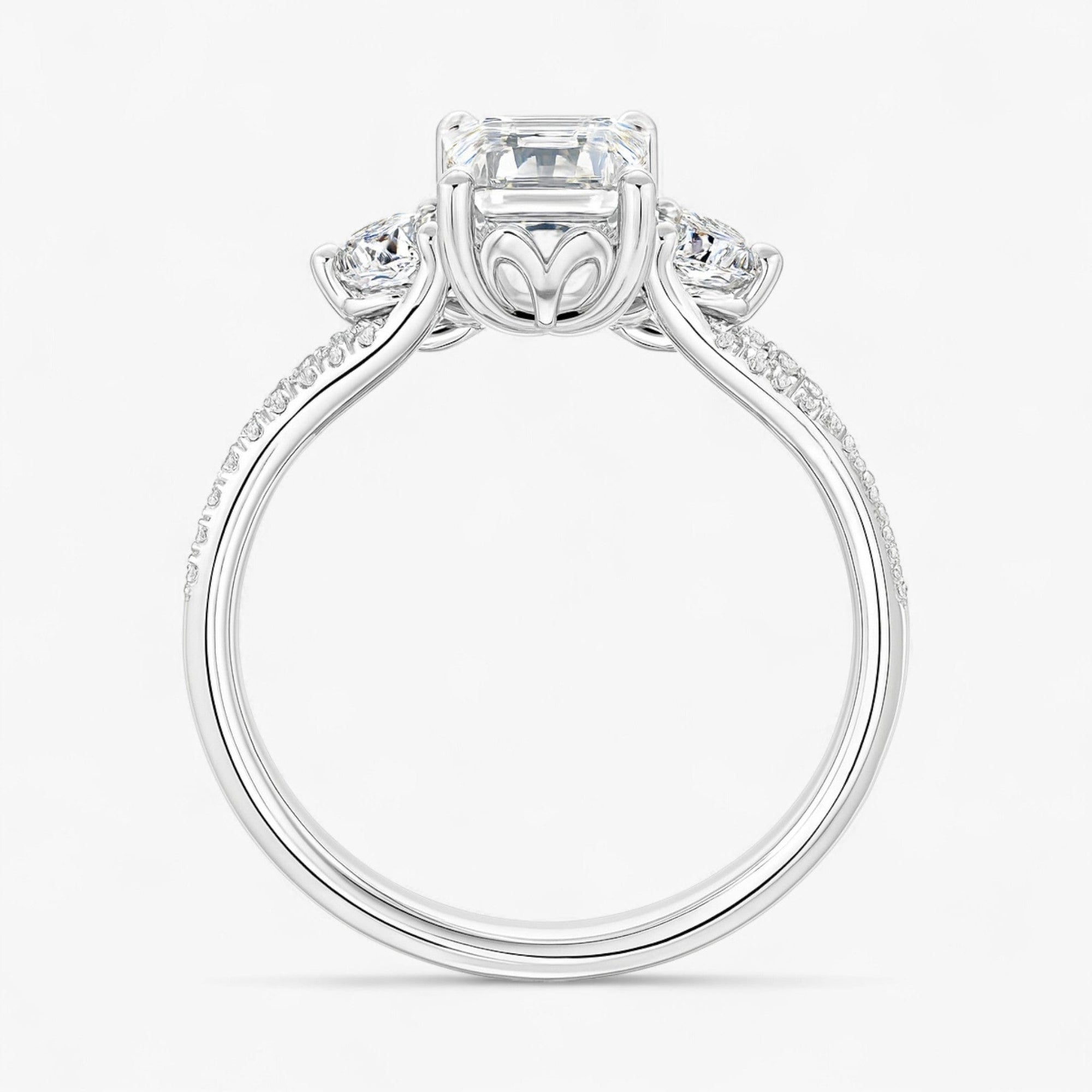 The Iconic 3-Stone Twisted Engagement Ring | Emerald