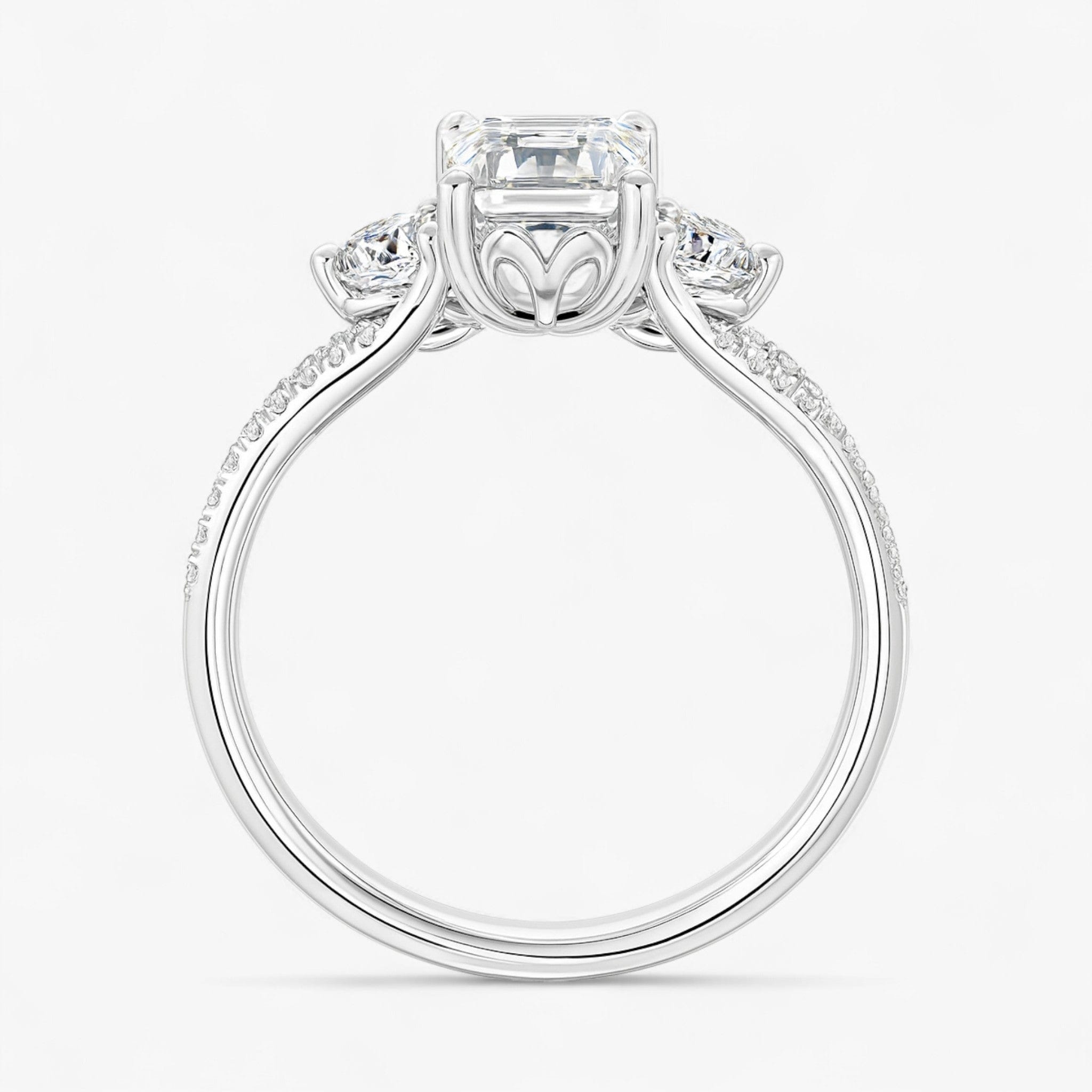 The Iconic 3-Stone Twisted Engagement Ring | Emerald