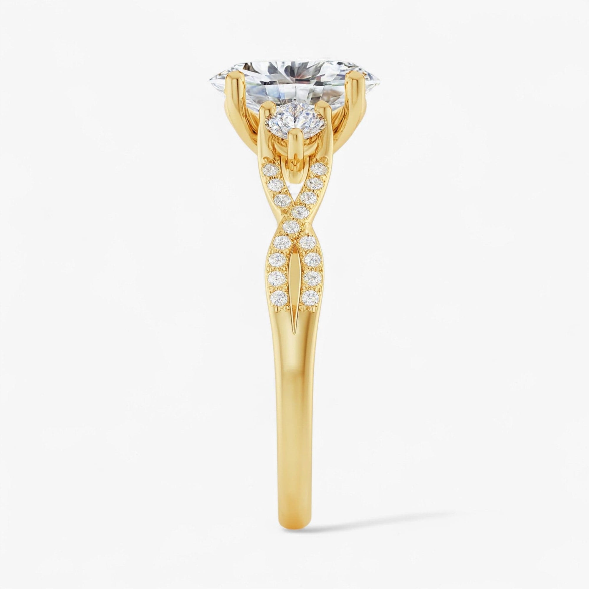 The Iconic 3-Stone Twisted Engagement Ring | Oval