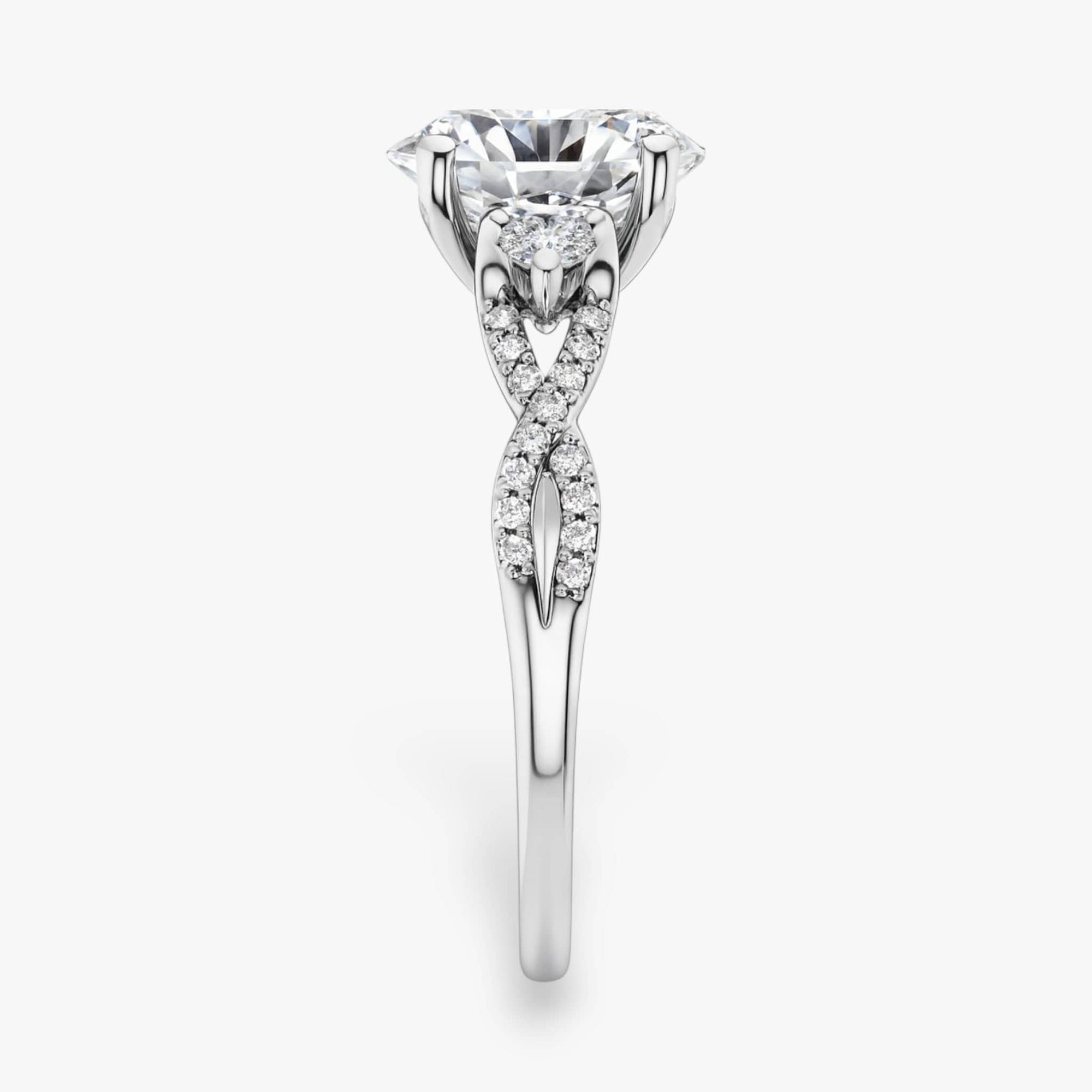 The Iconic 3-Stone Twisted Engagement Ring | Oval